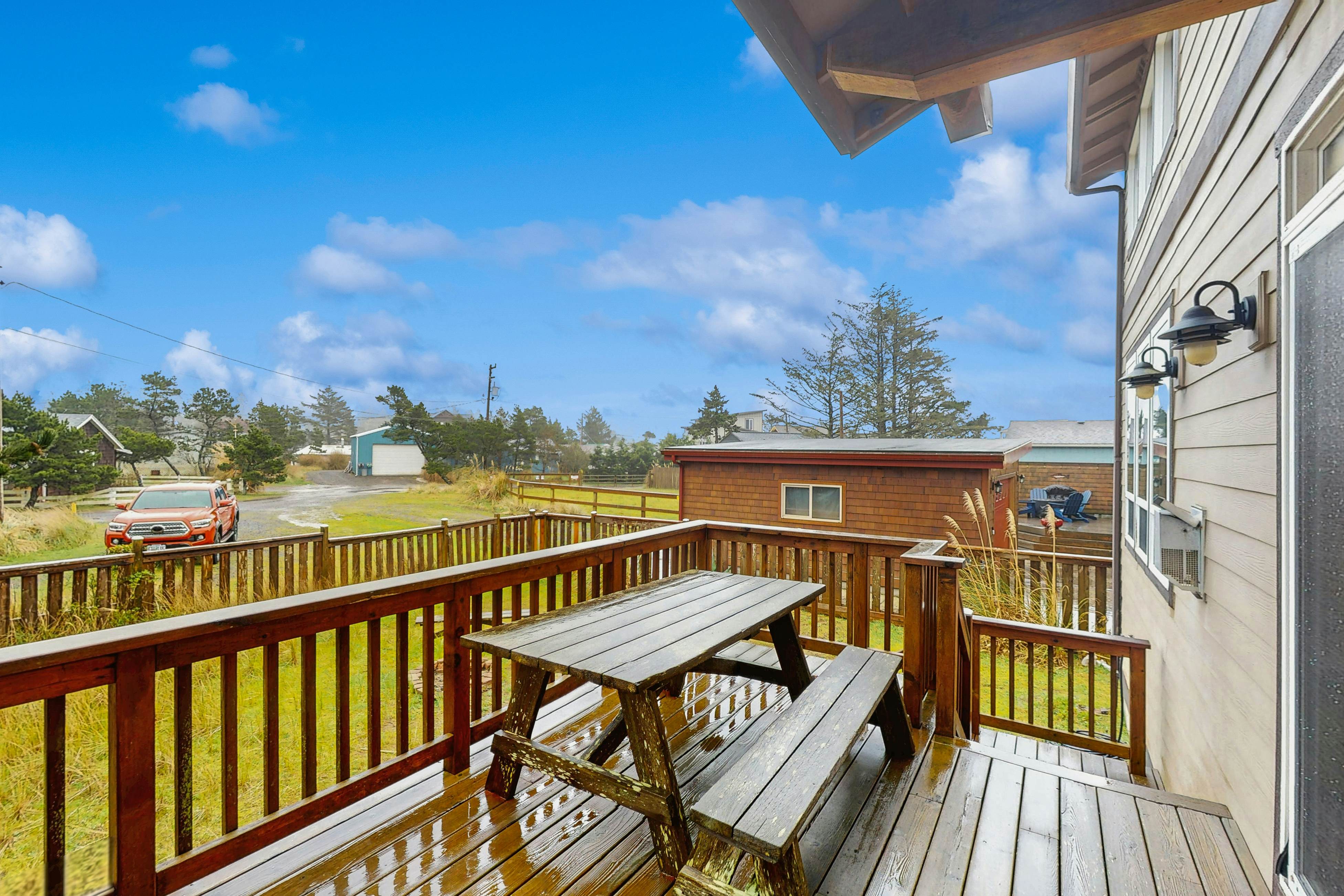 Family-friendly home with private hot tub, fireplace, & BBQ, close to beach