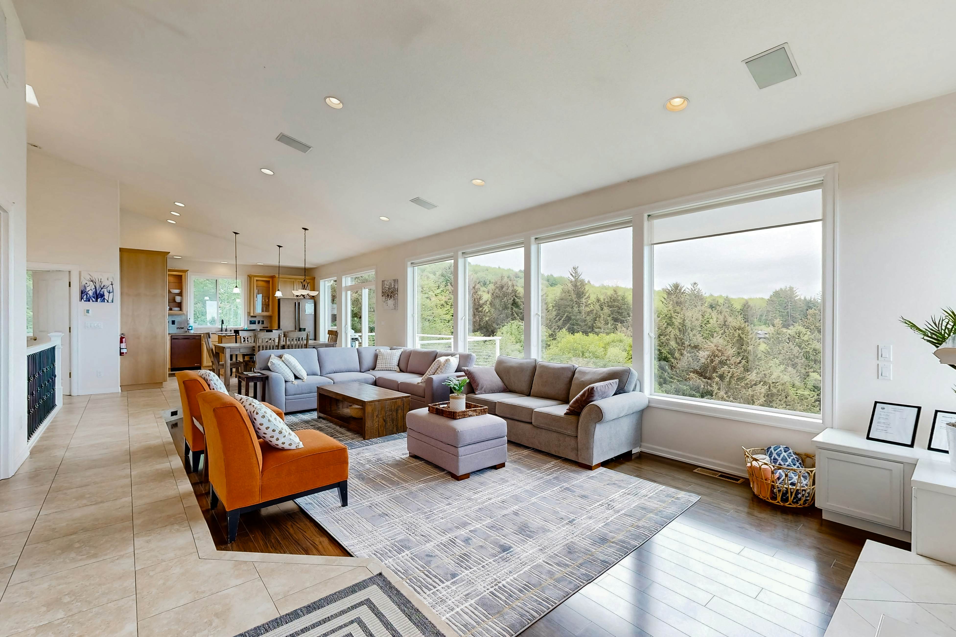 Ocean view home with heated floors, private hot tub, & multiple decks