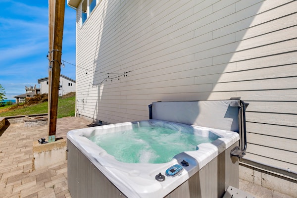 Ocean view home with heated floors private hot tub and multiple decks