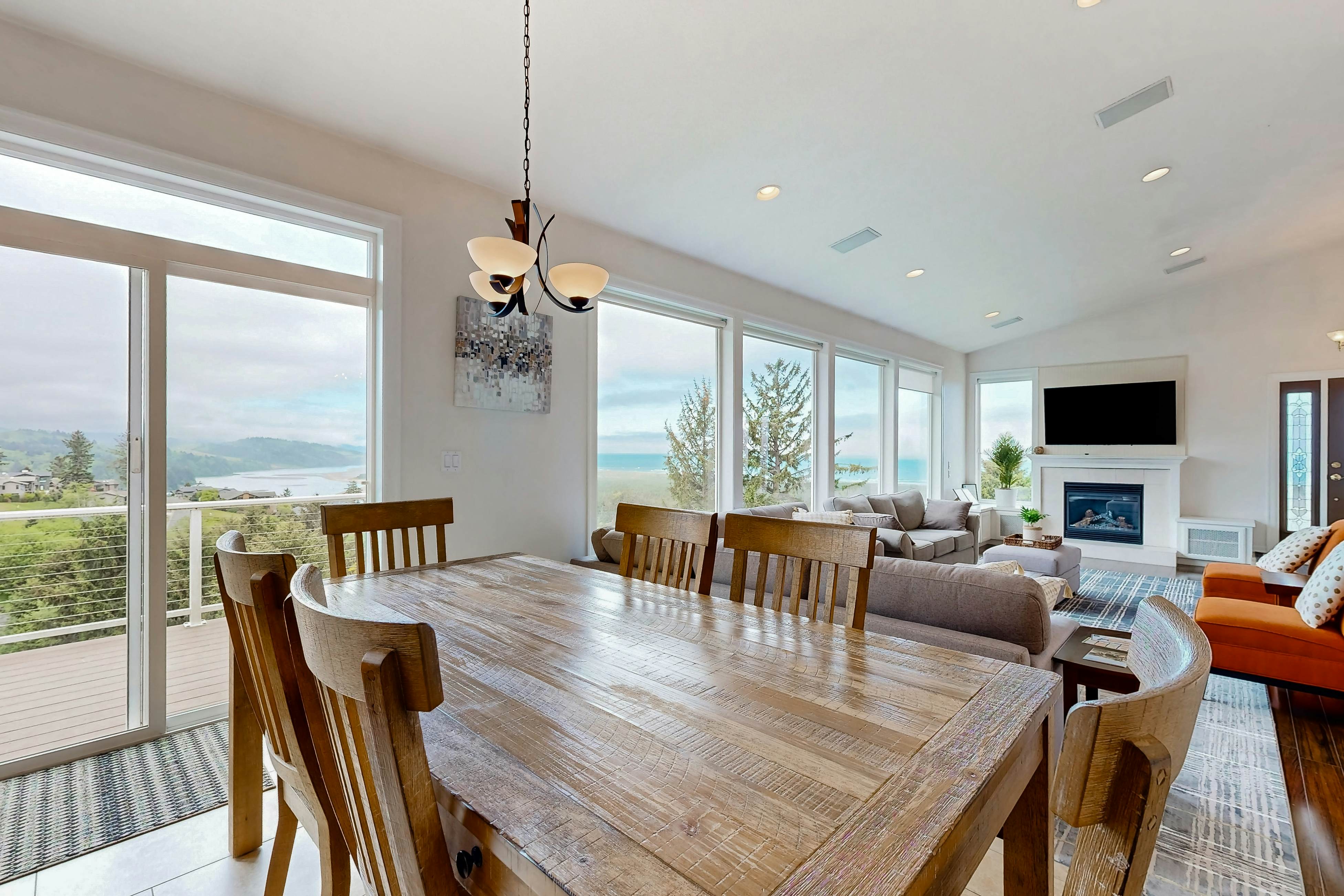Ocean view home with heated floors, private hot tub, & multiple decks