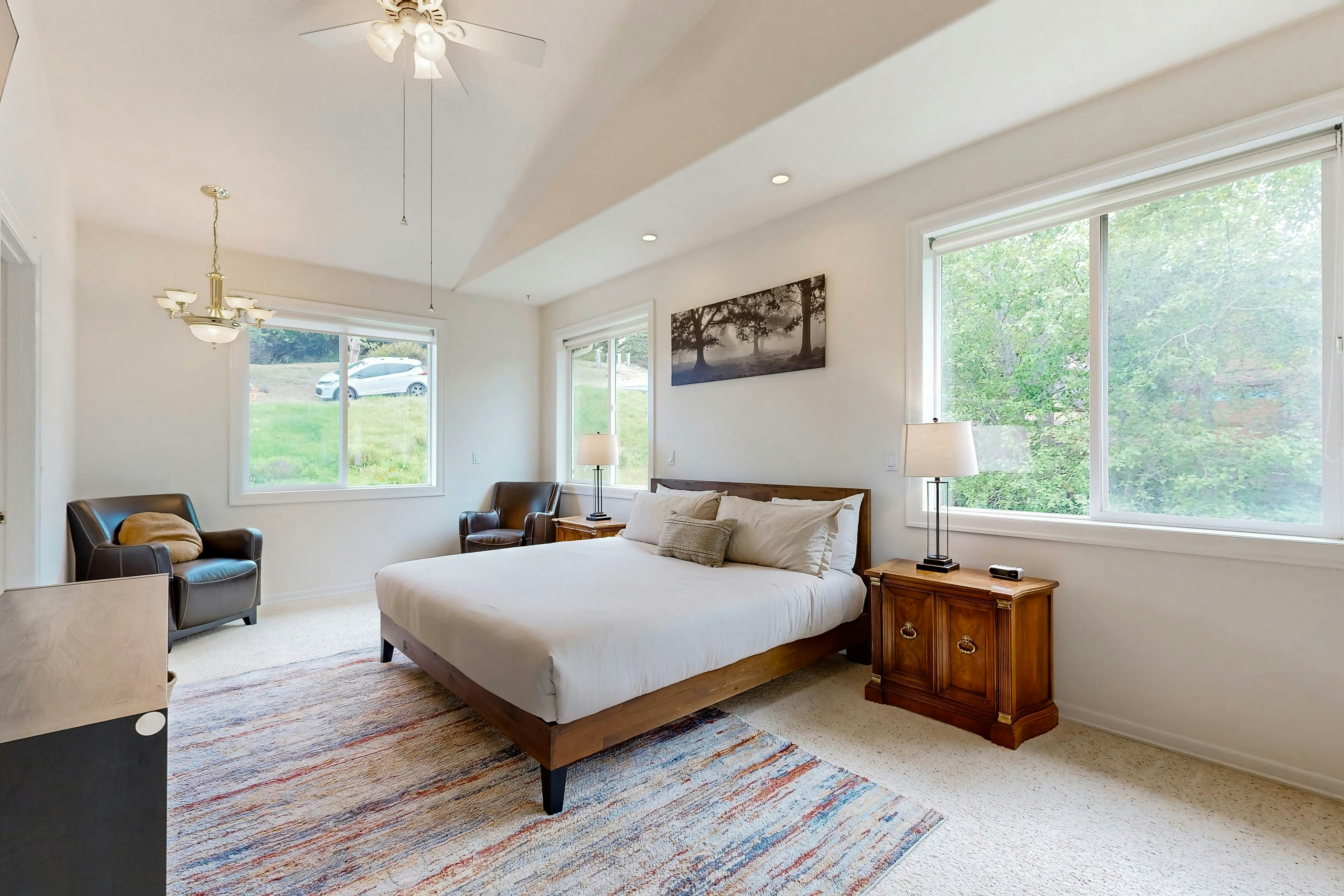 Ocean view home with heated floors, private hot tub, & multiple decks