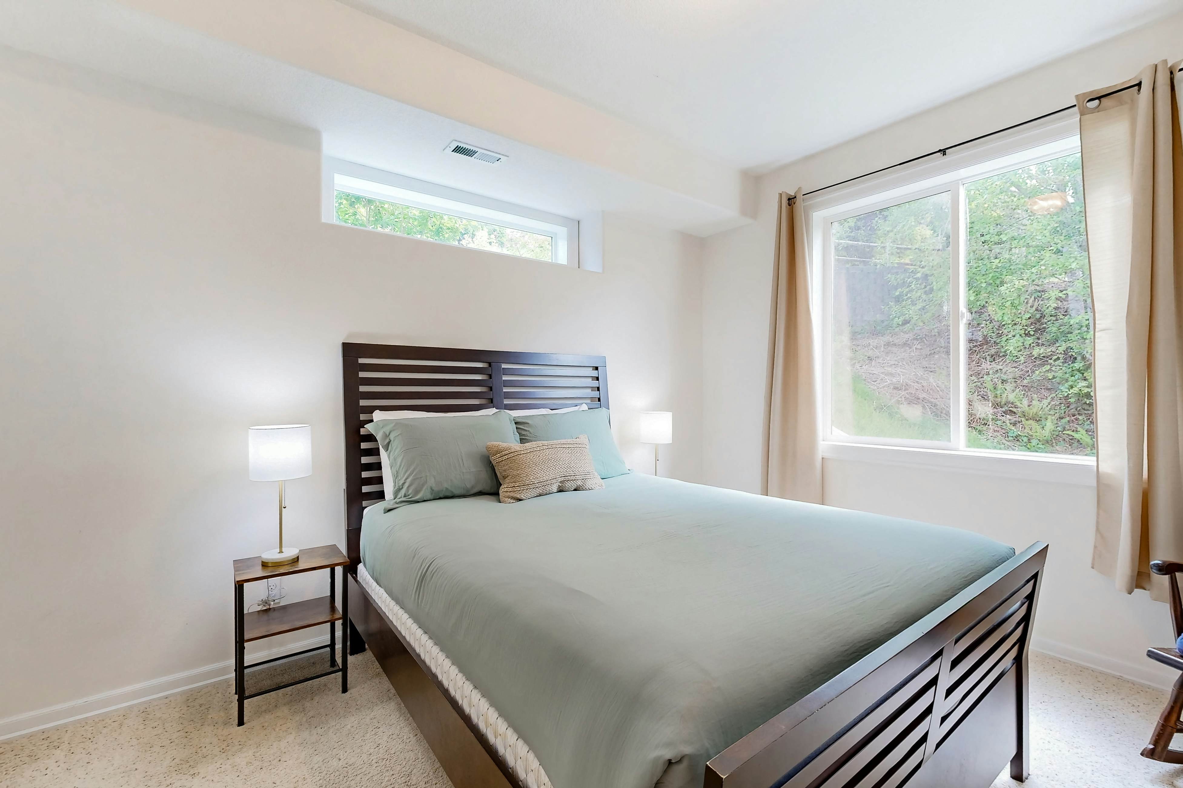 Ocean view home with heated floors, private hot tub, & multiple decks