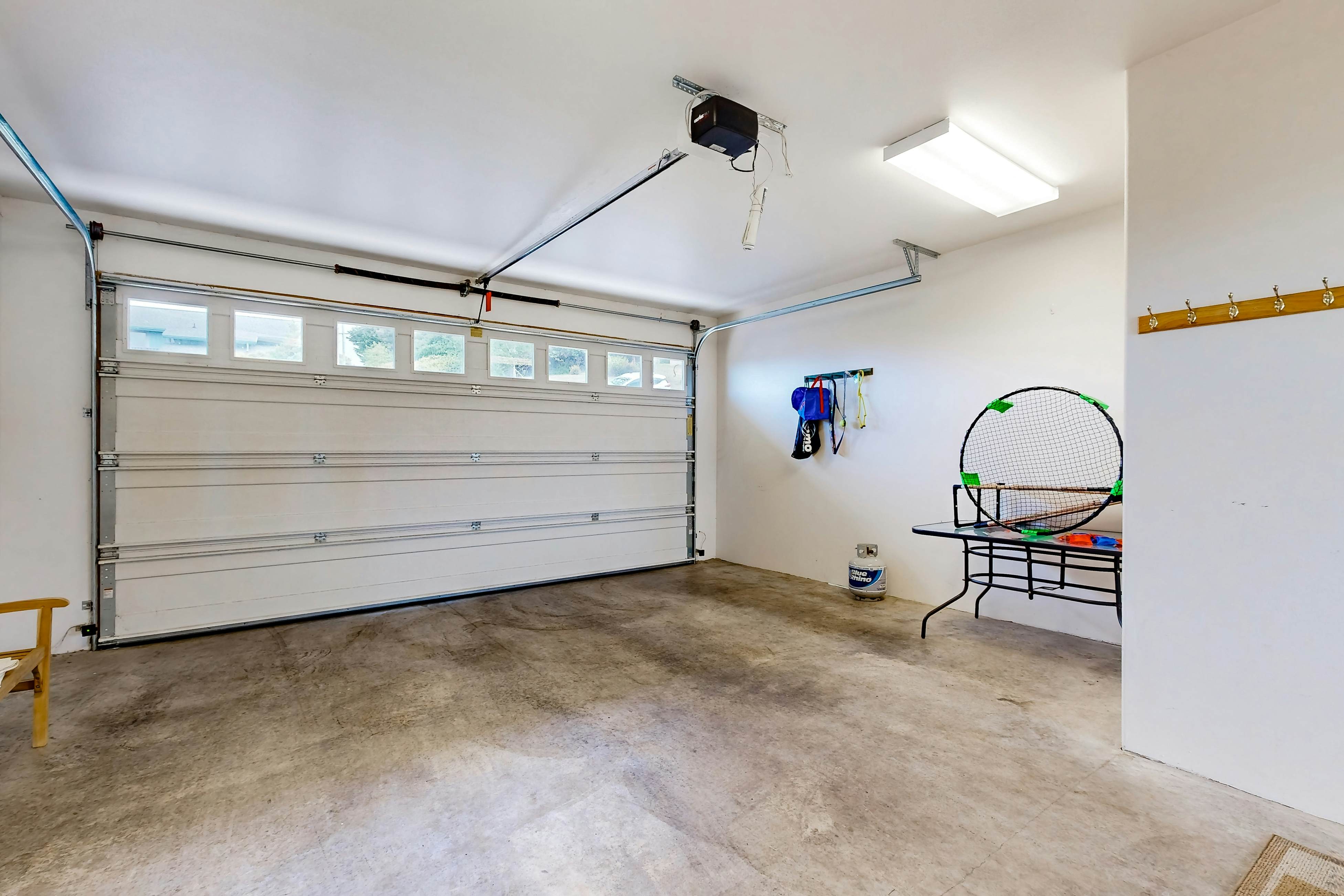 Ocean view home with heated floors, private hot tub, & multiple decks