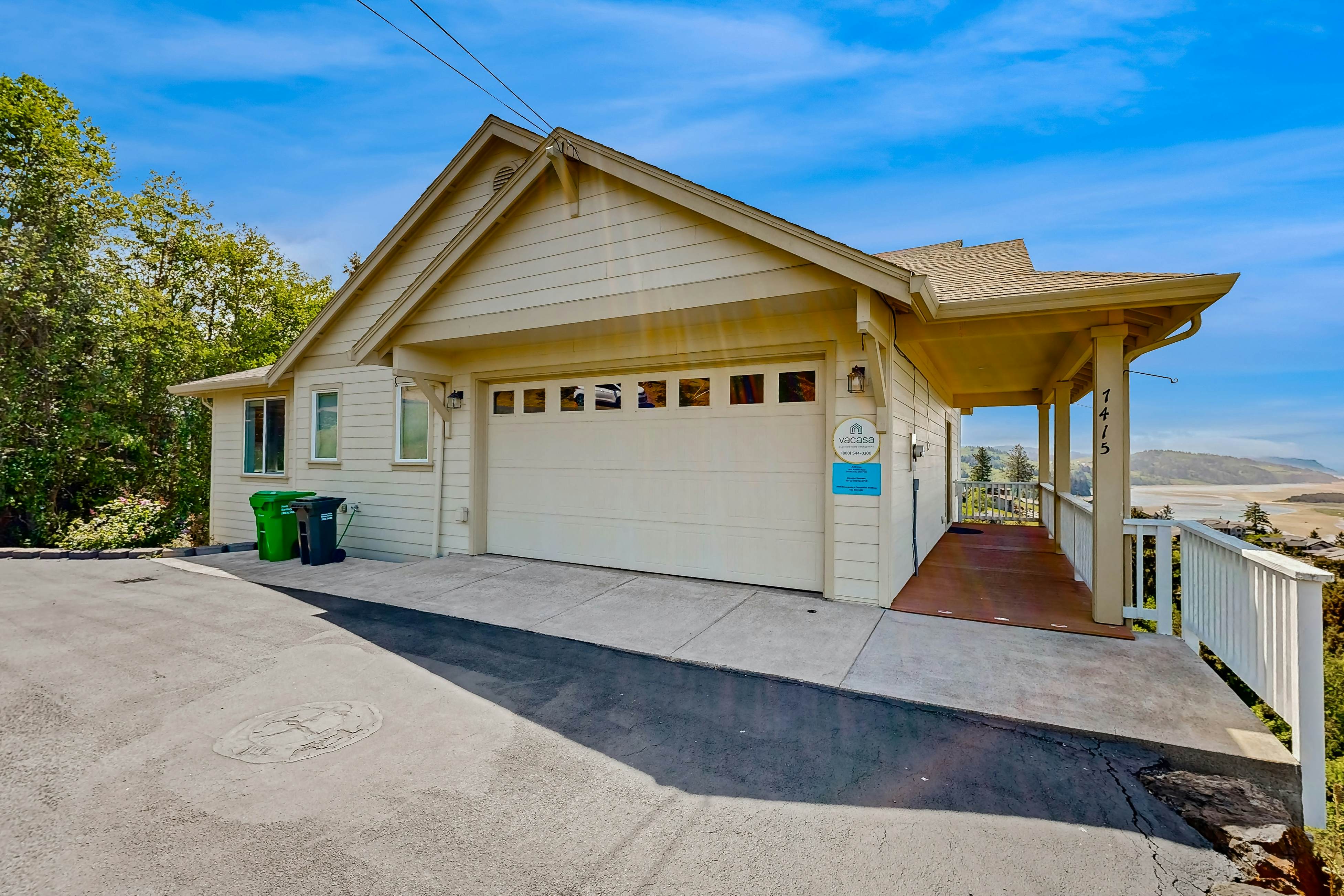 Ocean view home with heated floors, private hot tub, & multiple decks