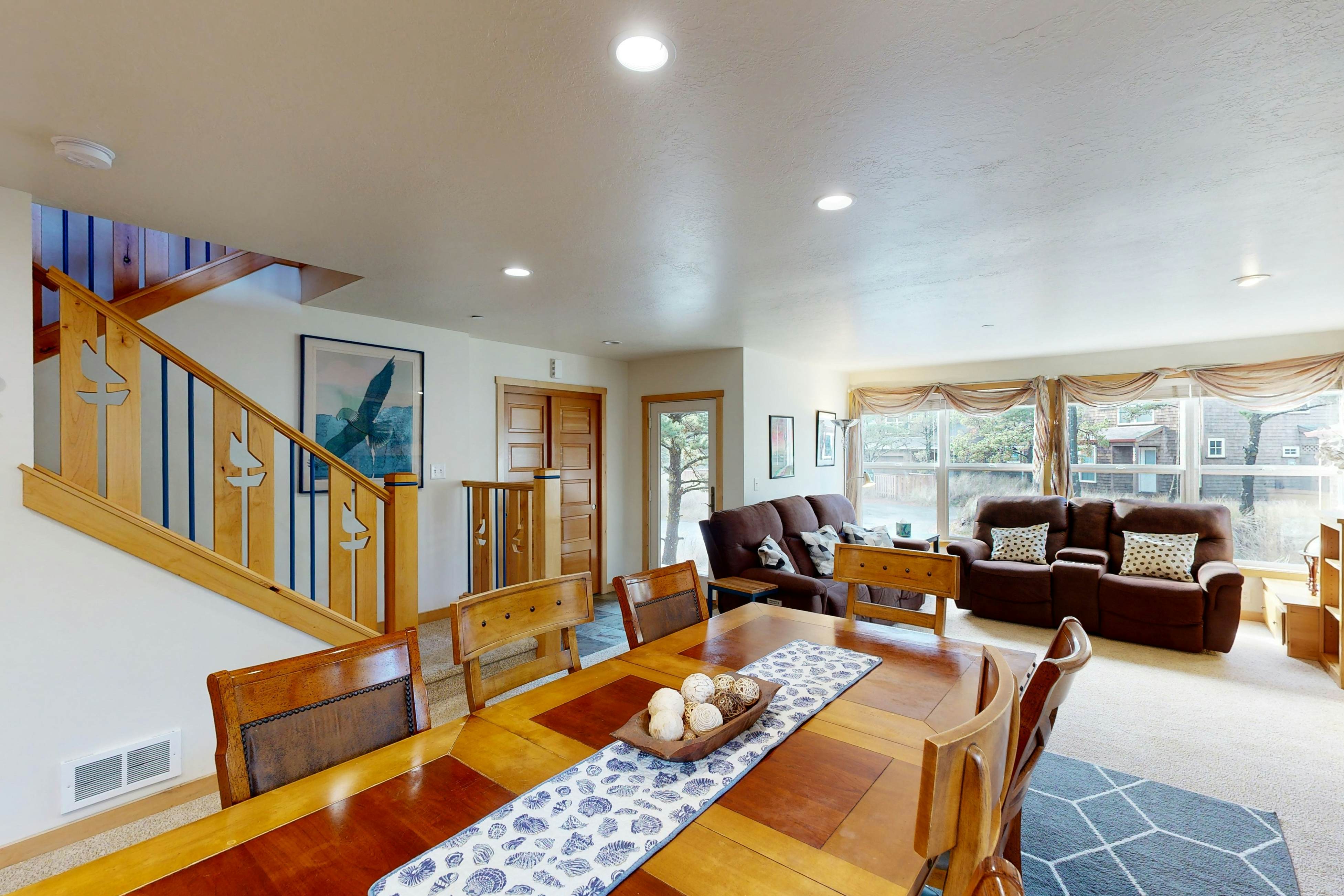 Coastal home walking distance to the beach with outdoor shower & fireplace