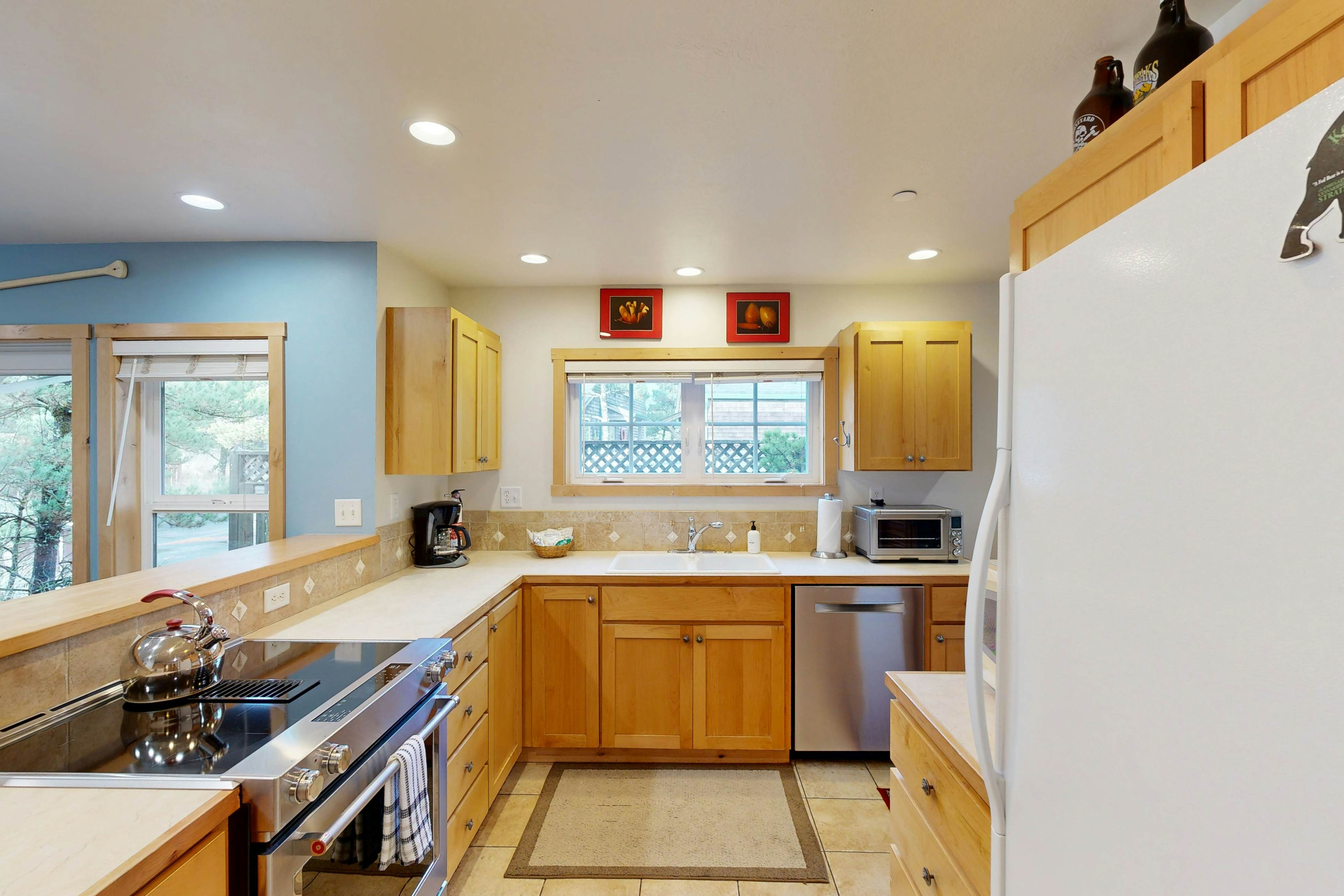 Coastal home walking distance to the beach with outdoor shower & fireplace