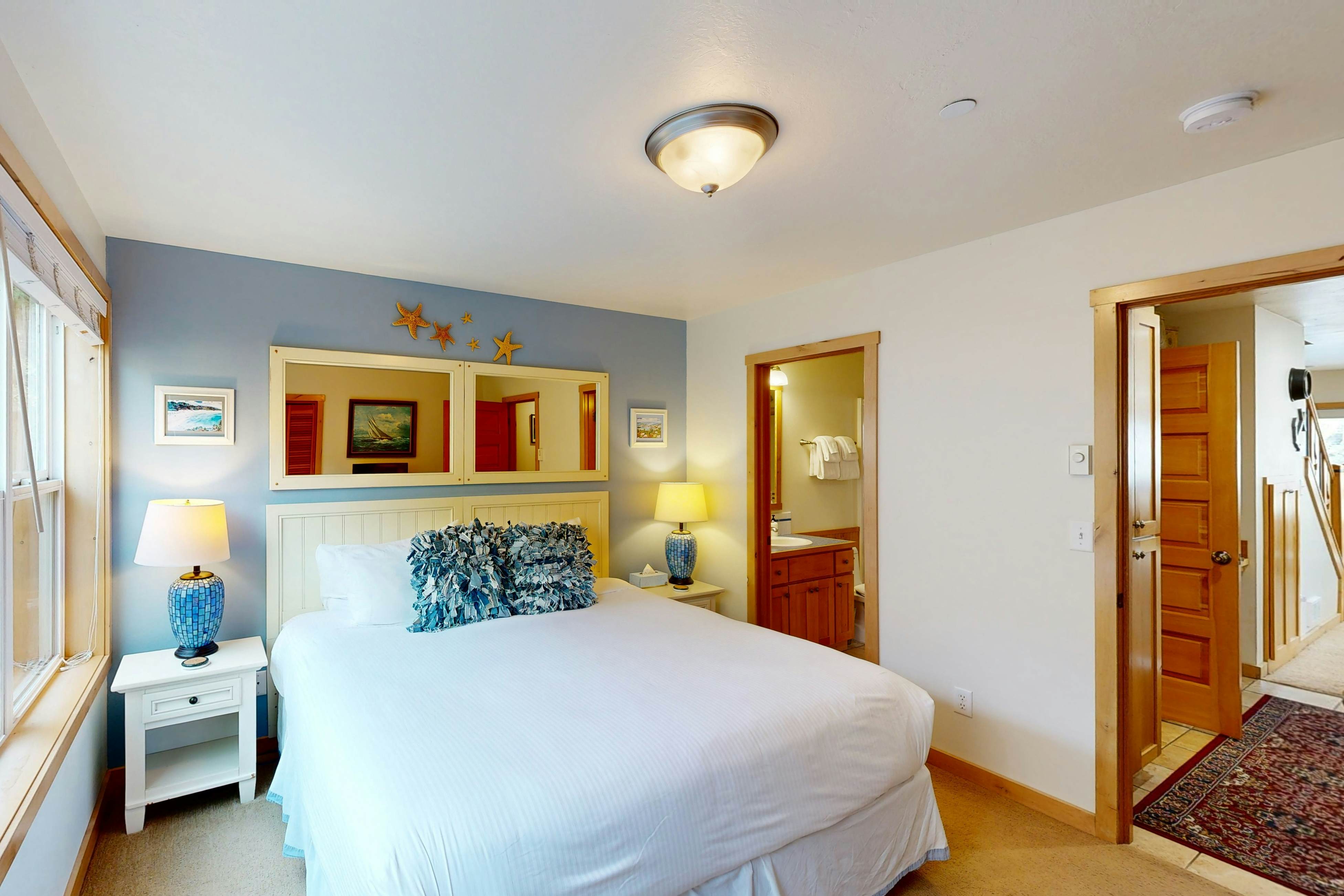 Coastal home walking distance to the beach with outdoor shower & fireplace