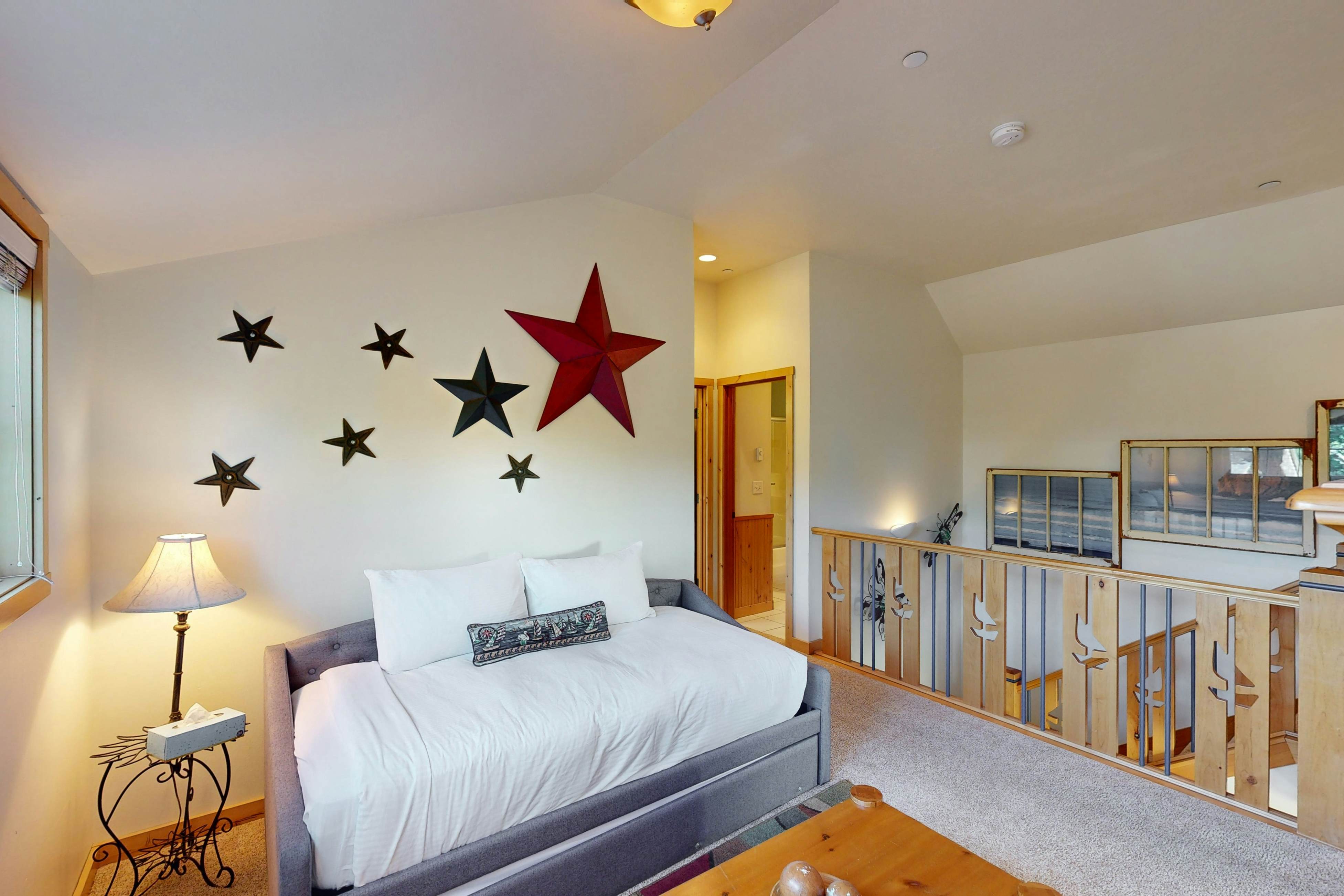 Coastal home walking distance to the beach with outdoor shower & fireplace