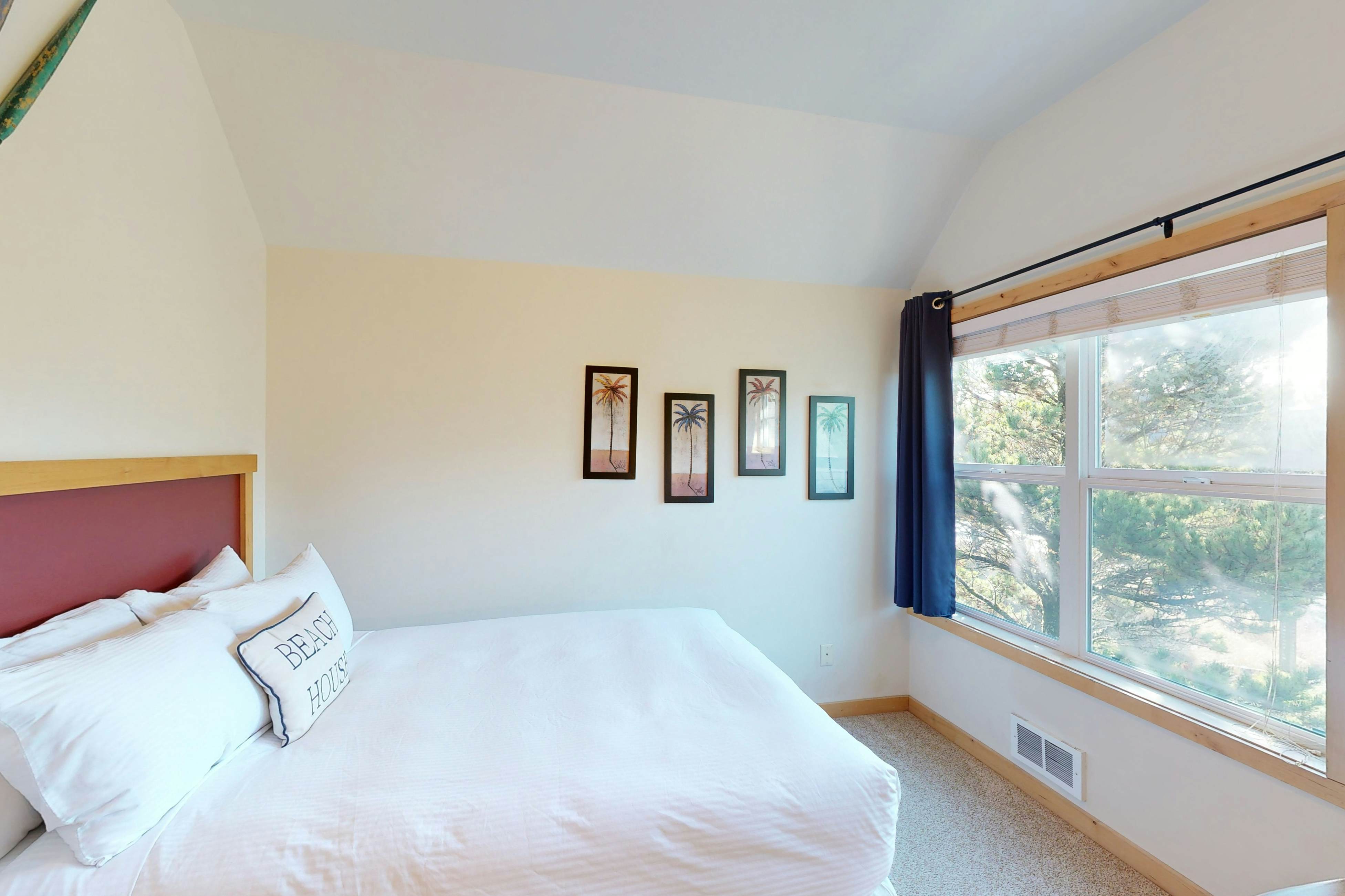 Coastal home walking distance to the beach with outdoor shower & fireplace