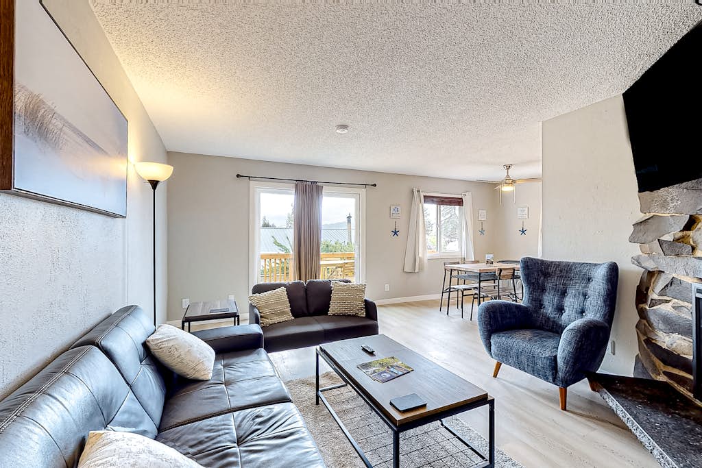 Water view retreat with scenic deck grill yard fireplace board games and with D