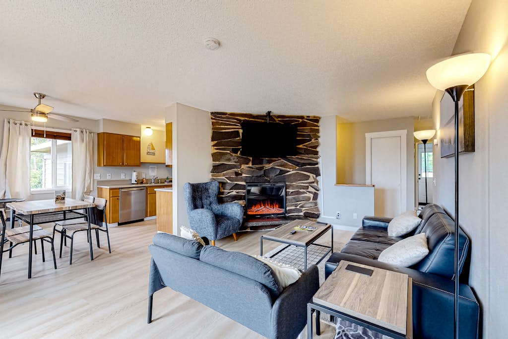 Water view retreat with scenic deck grill yard fireplace board games and with D