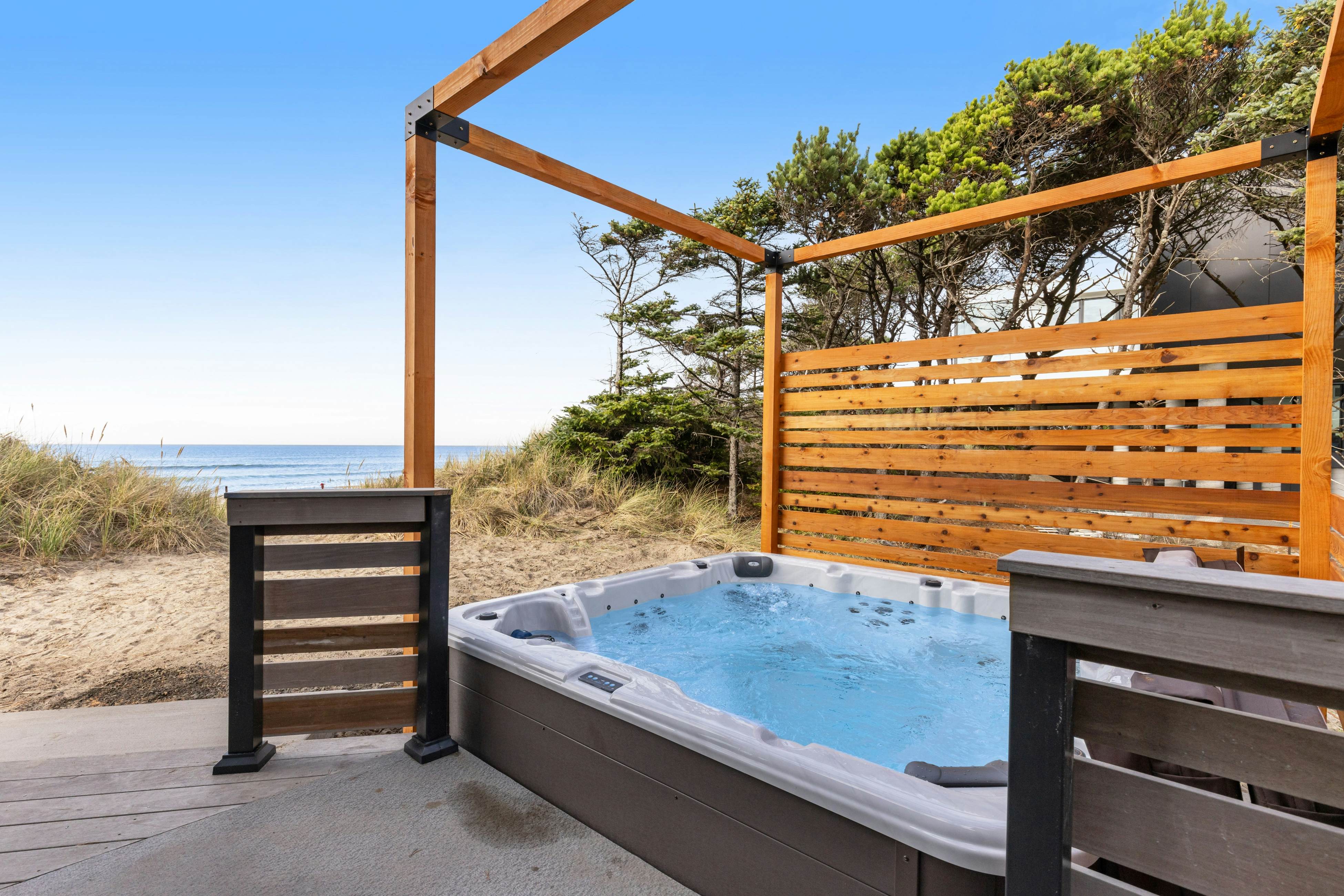 Beachfront designer paradise with amazing ocean view hot tub and shuffleboard