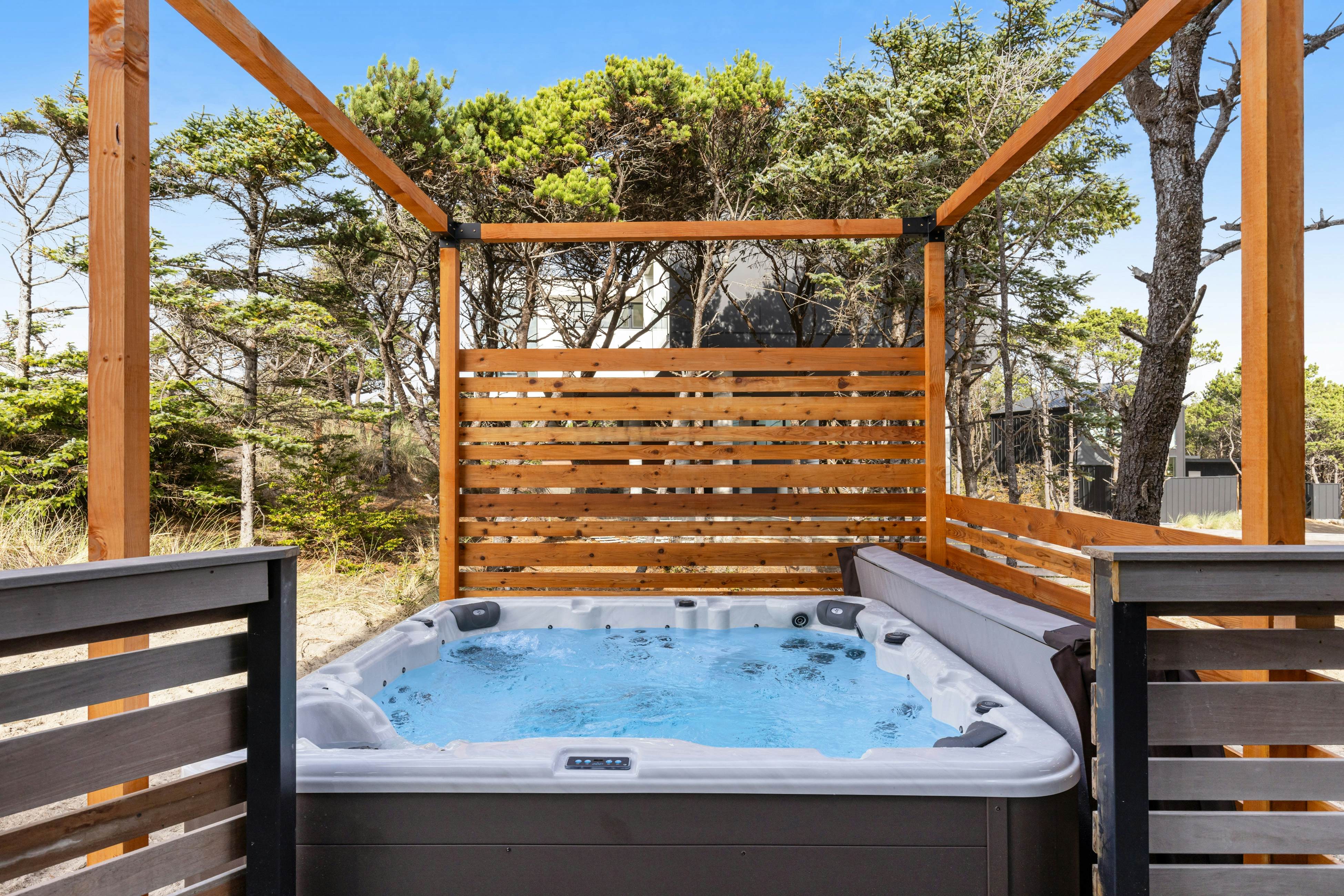 Beachfront designer paradise with amazing ocean view hot tub and shuffleboard