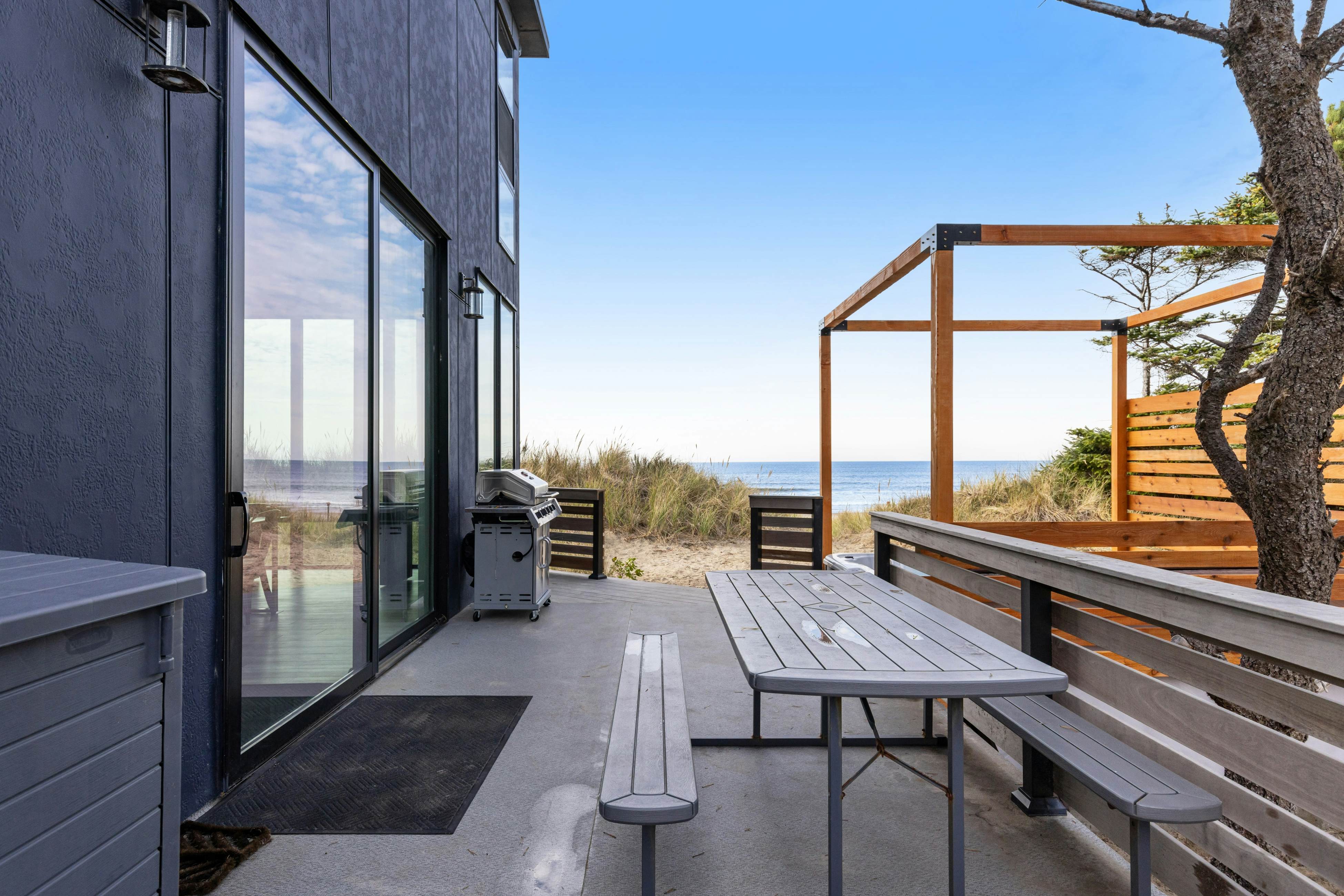 Beachfront designer paradise with amazing ocean view hot tub and shuffleboard