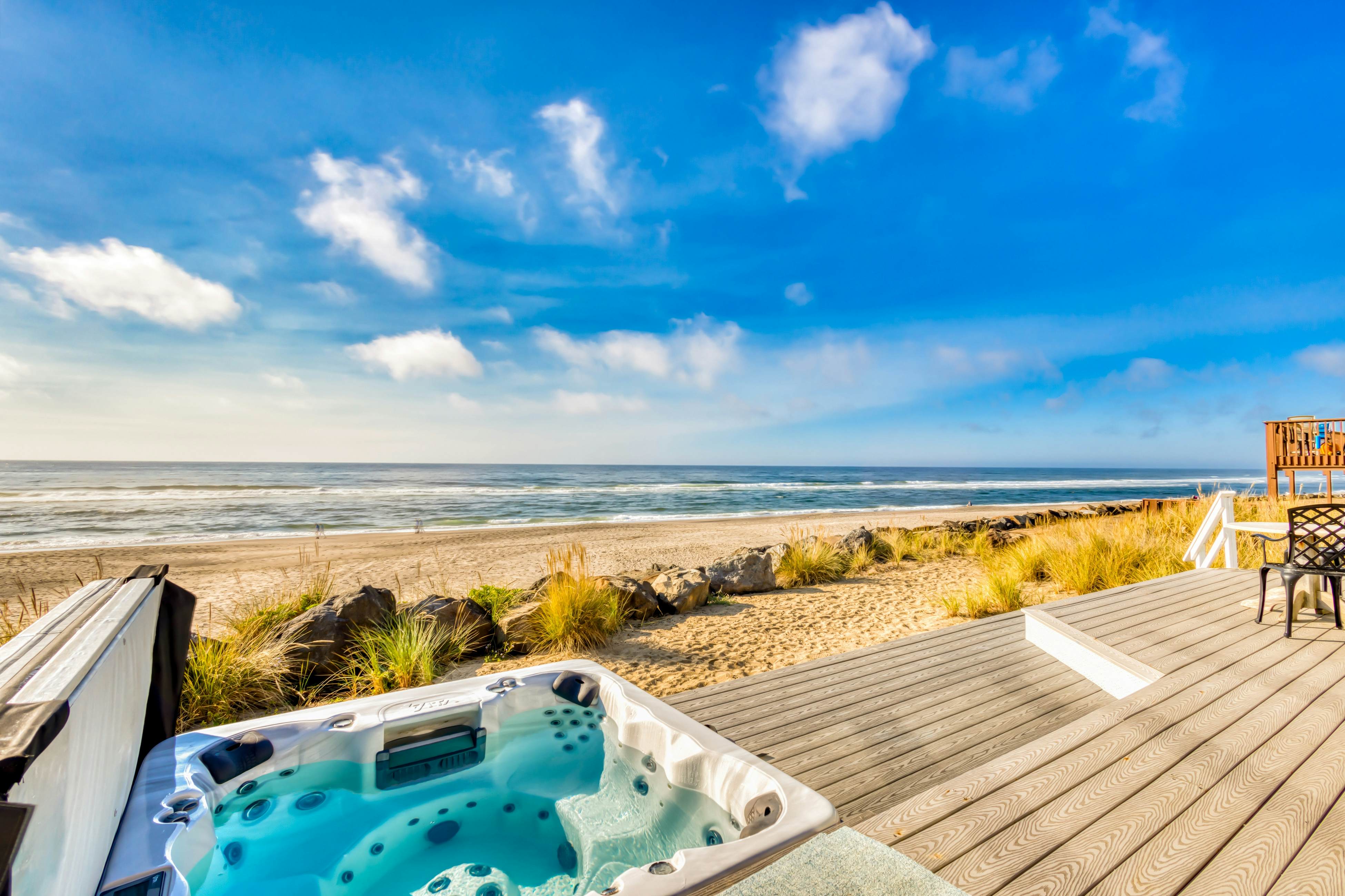 Beachfront home with ocean-view hot tub & wood-burning fireplace - dog-friendly