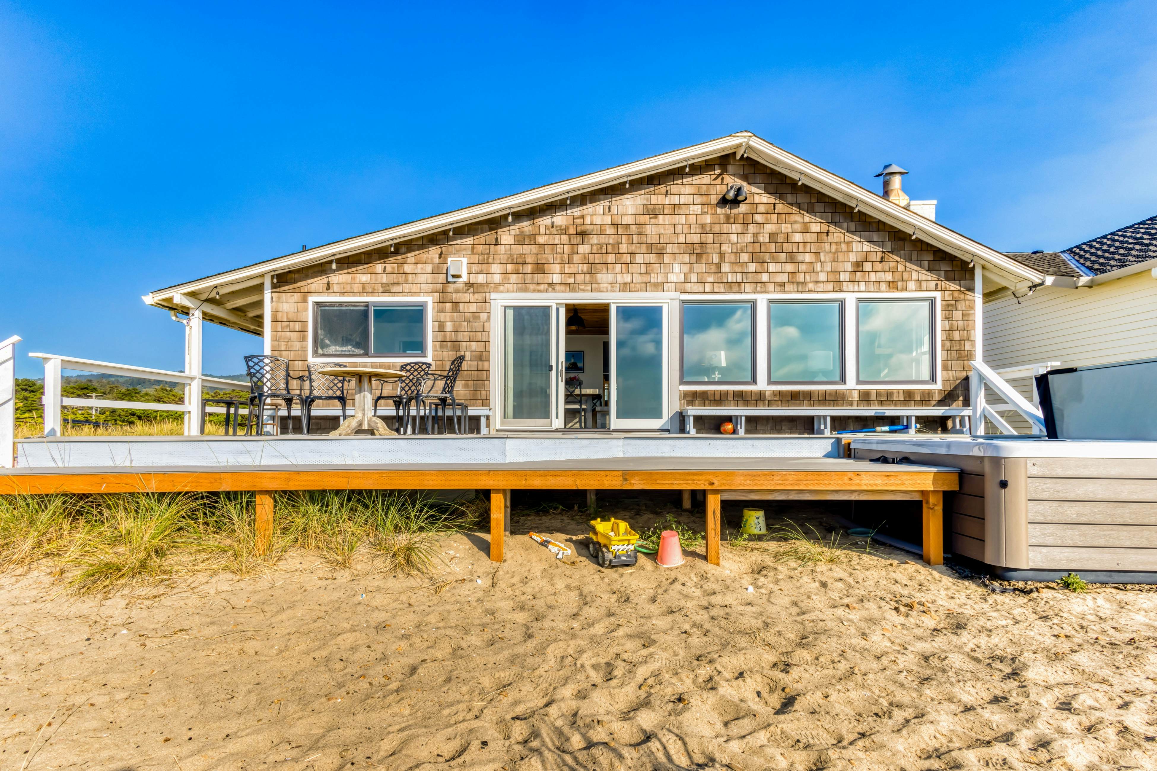 Beachfront home with ocean-view hot tub & wood-burning fireplace - dog-friendly
