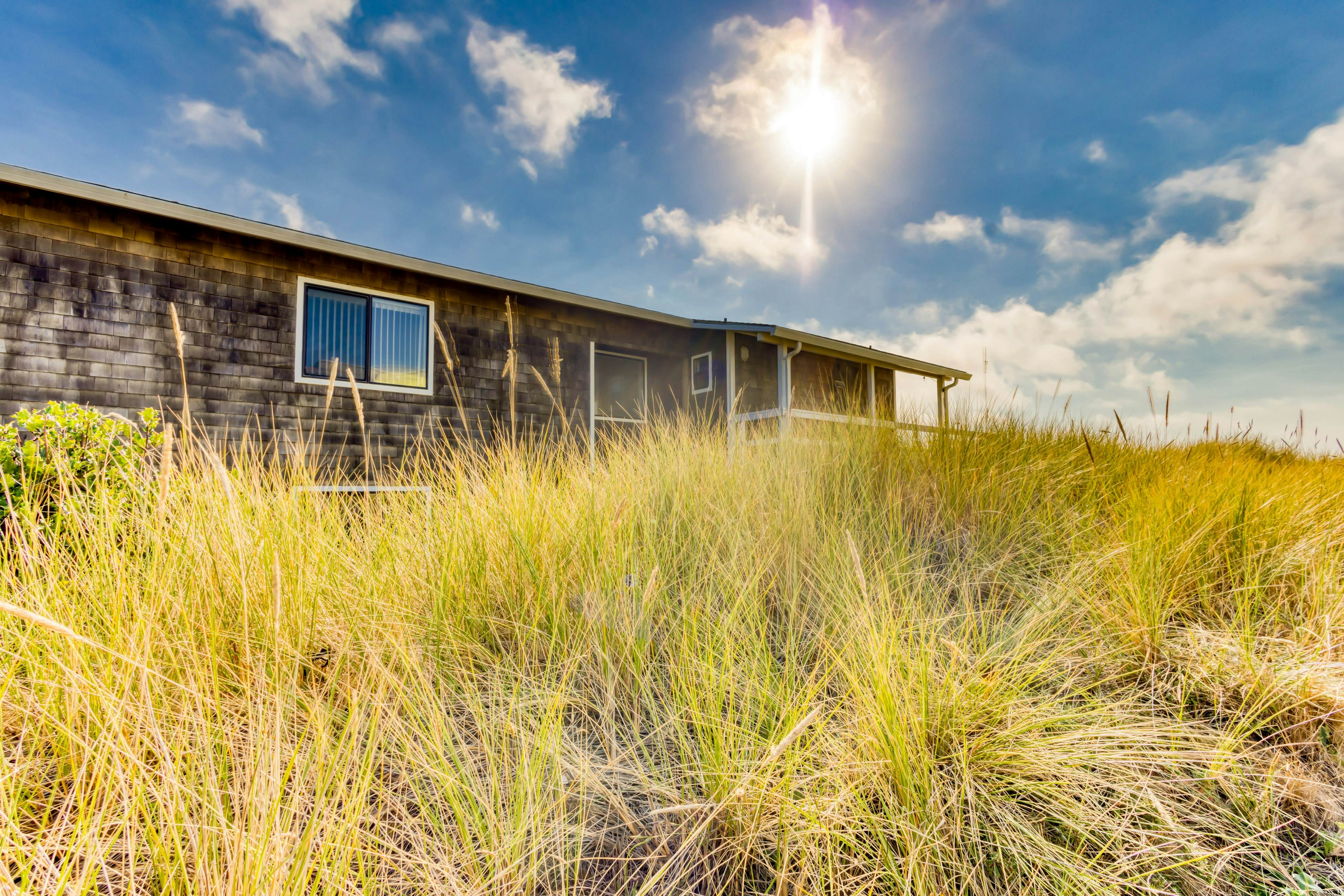 Beachfront home with ocean-view hot tub & wood-burning fireplace - dog-friendly
