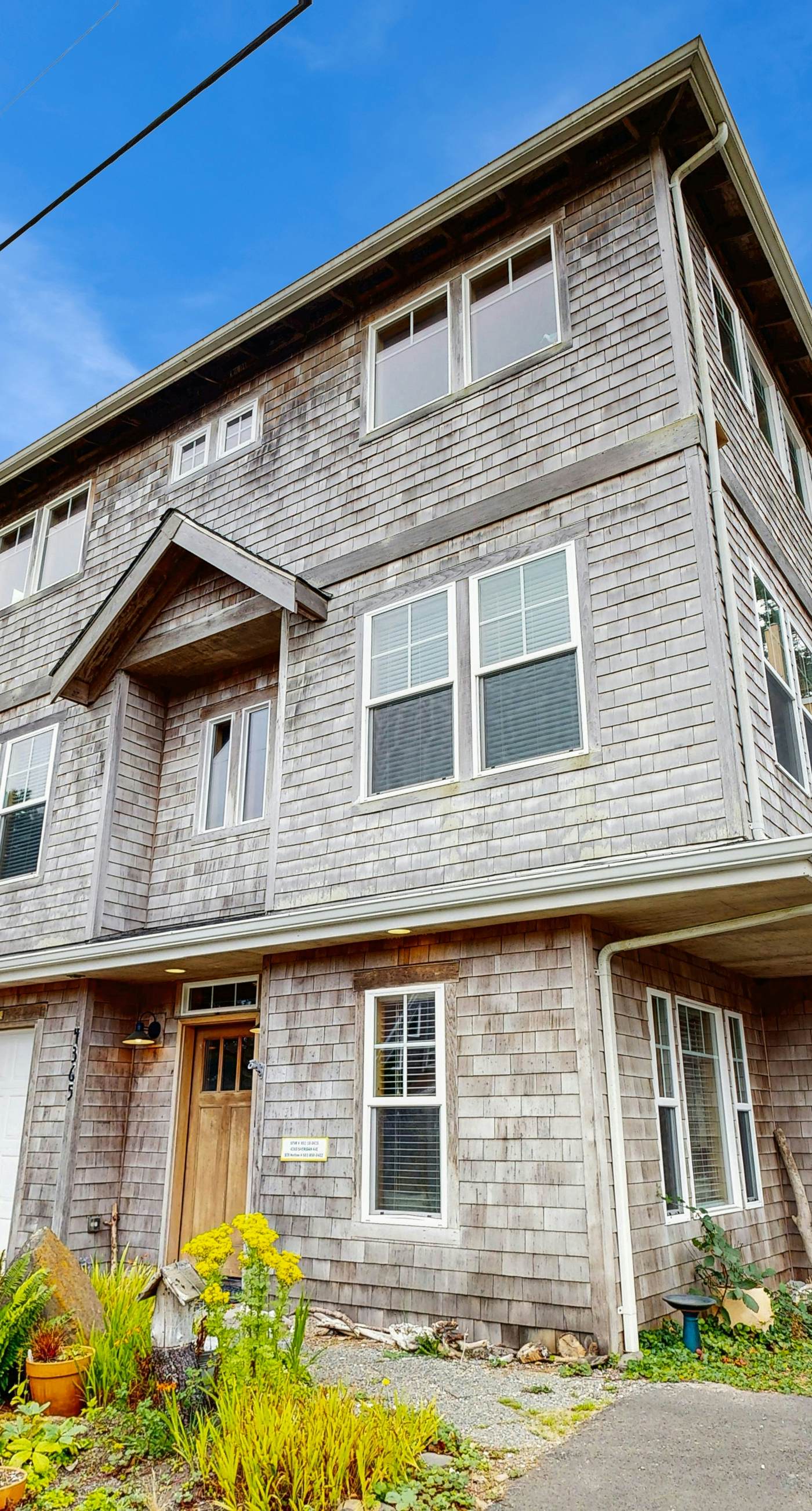 Dog friendly Neskowin Village home with ocean views private hot tub and patio