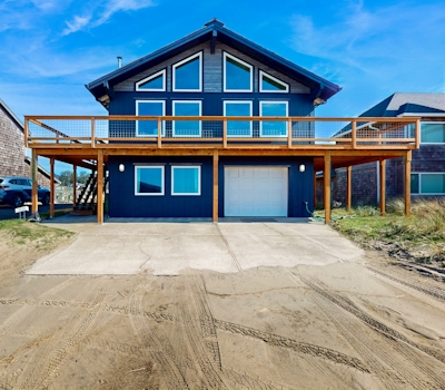 Designer home with stunning ocean and sunset views steps to beach dog friendly