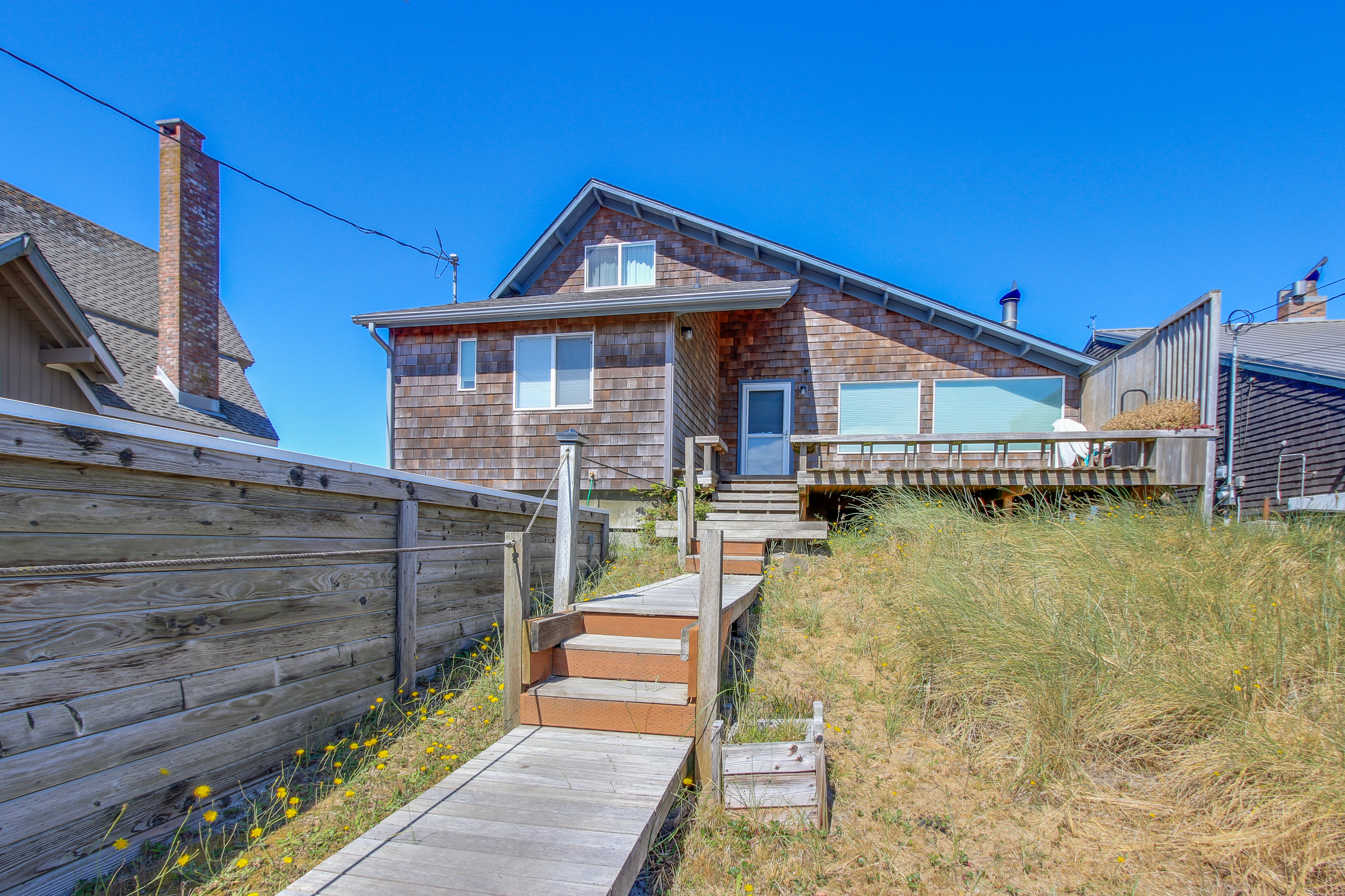 Modern oceanfront home with stunning ocean views and nearby beach access