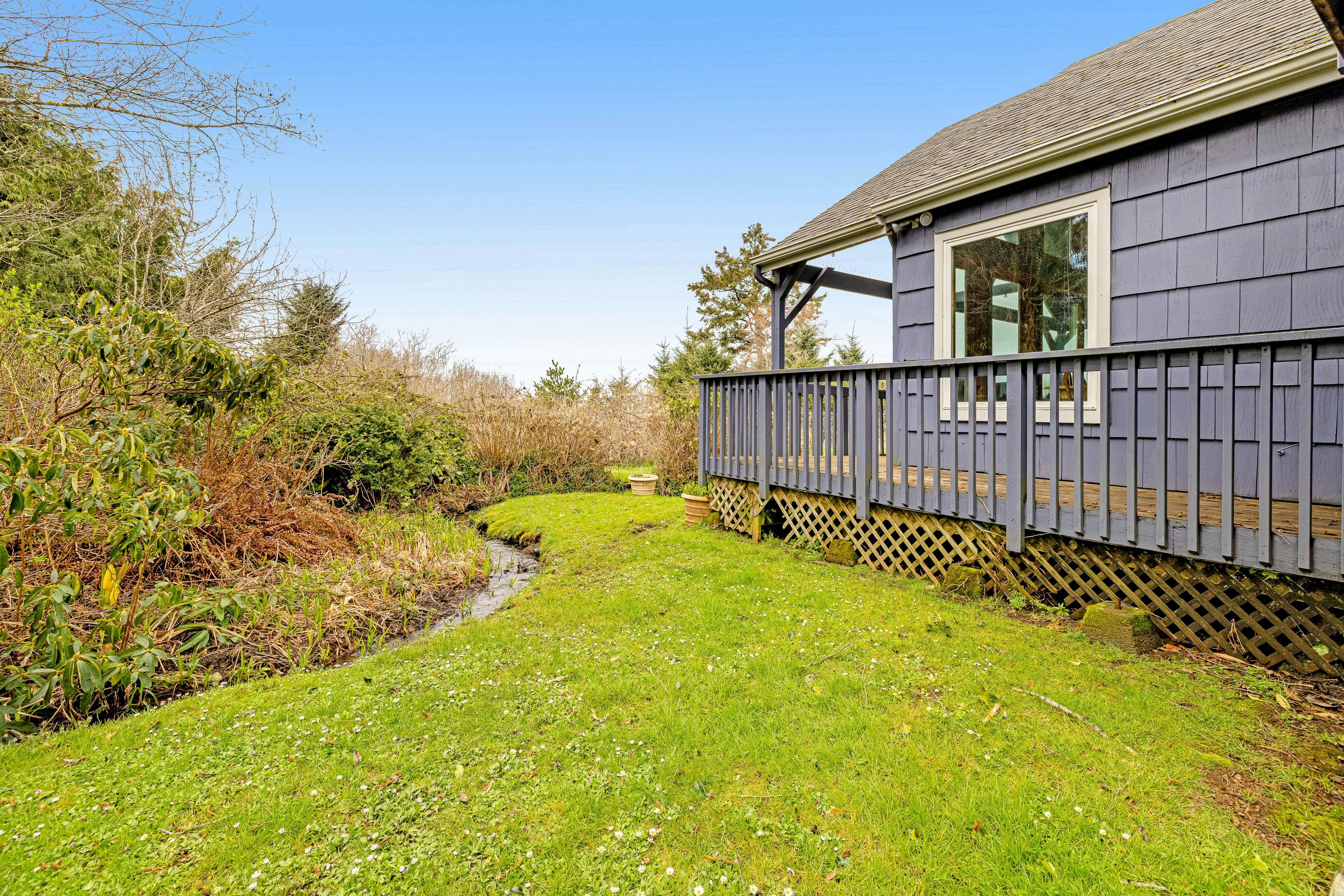 Serene Sandlake Bayfront Home with WiFi & Private Hot Tub - Dogs Welcome