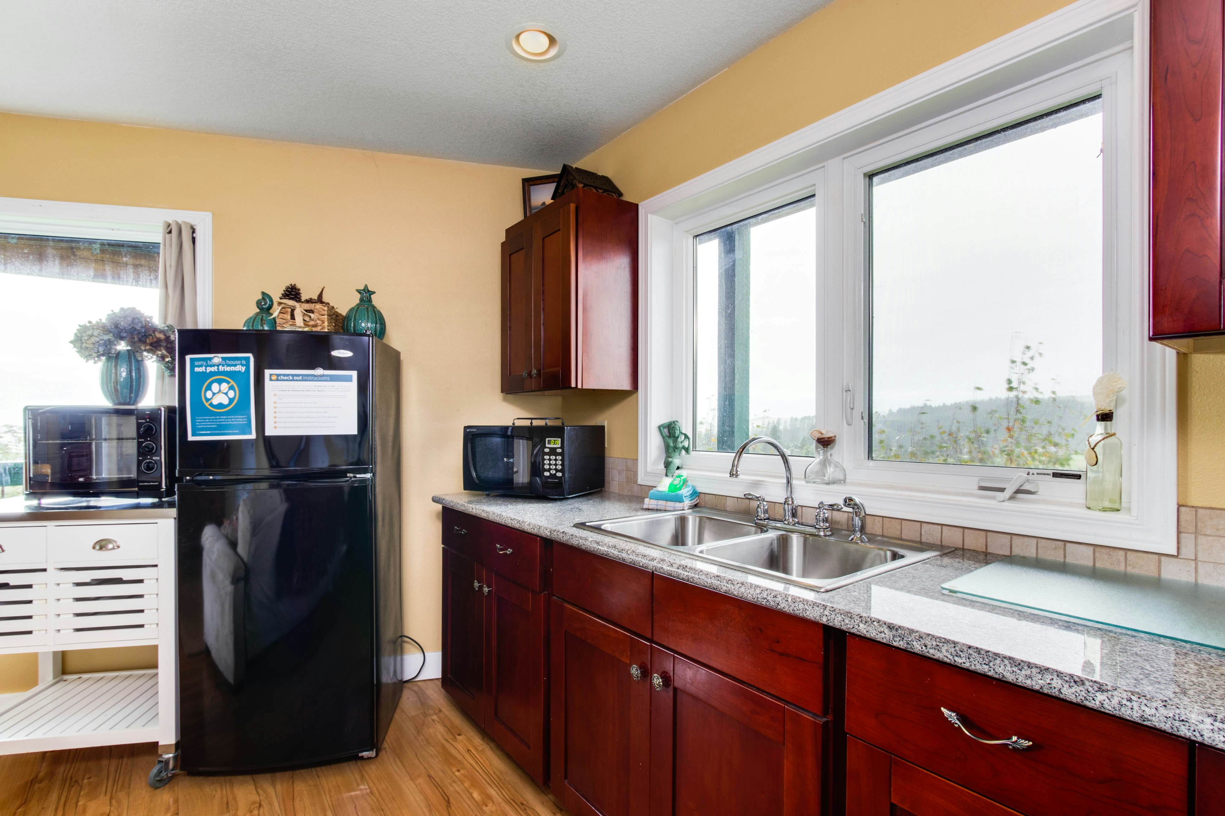 Bright & open hillside home with sprawling ocean views