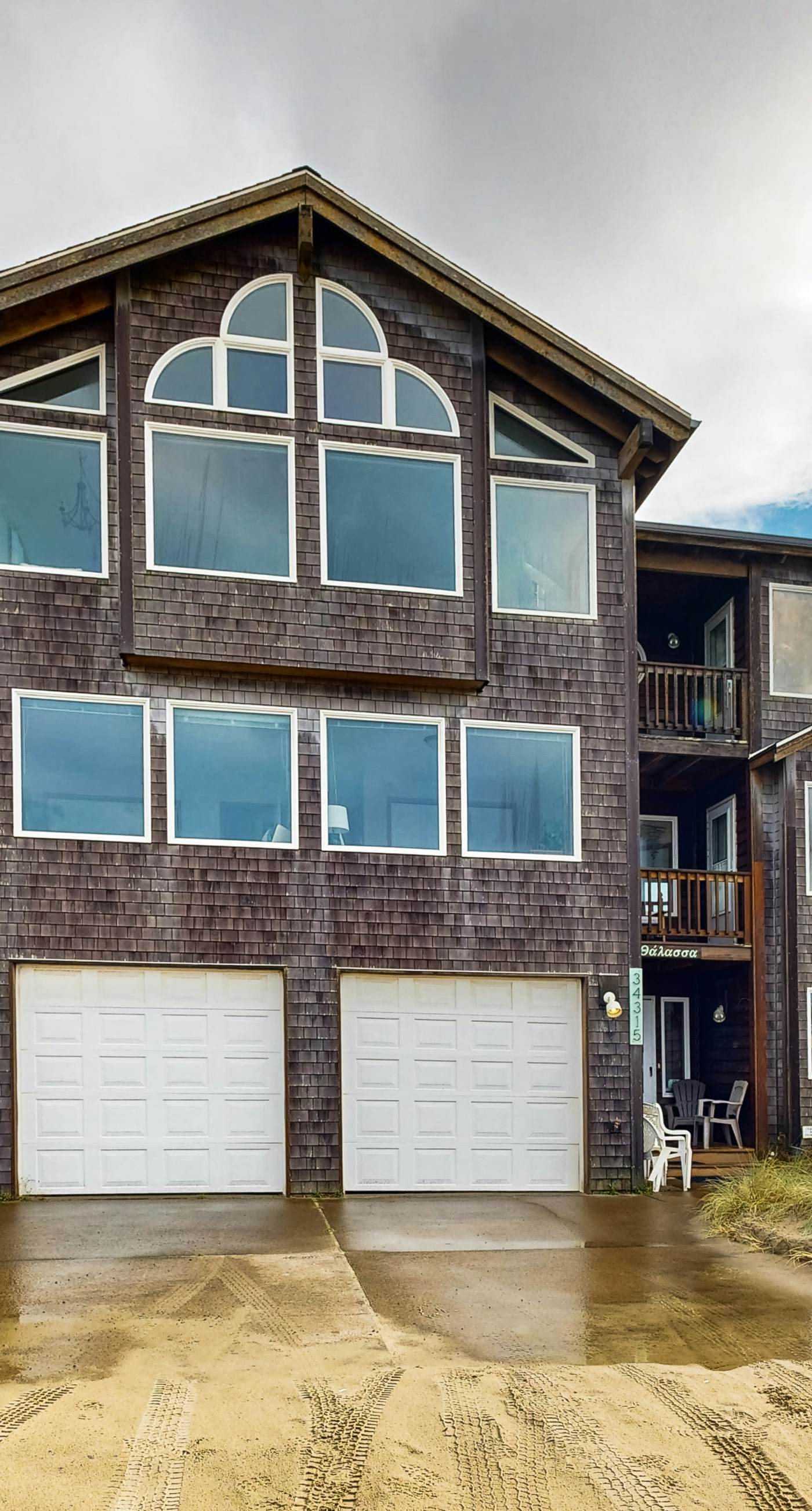 Gorgeous waterfront home with ocean views a furnished deck and beach access