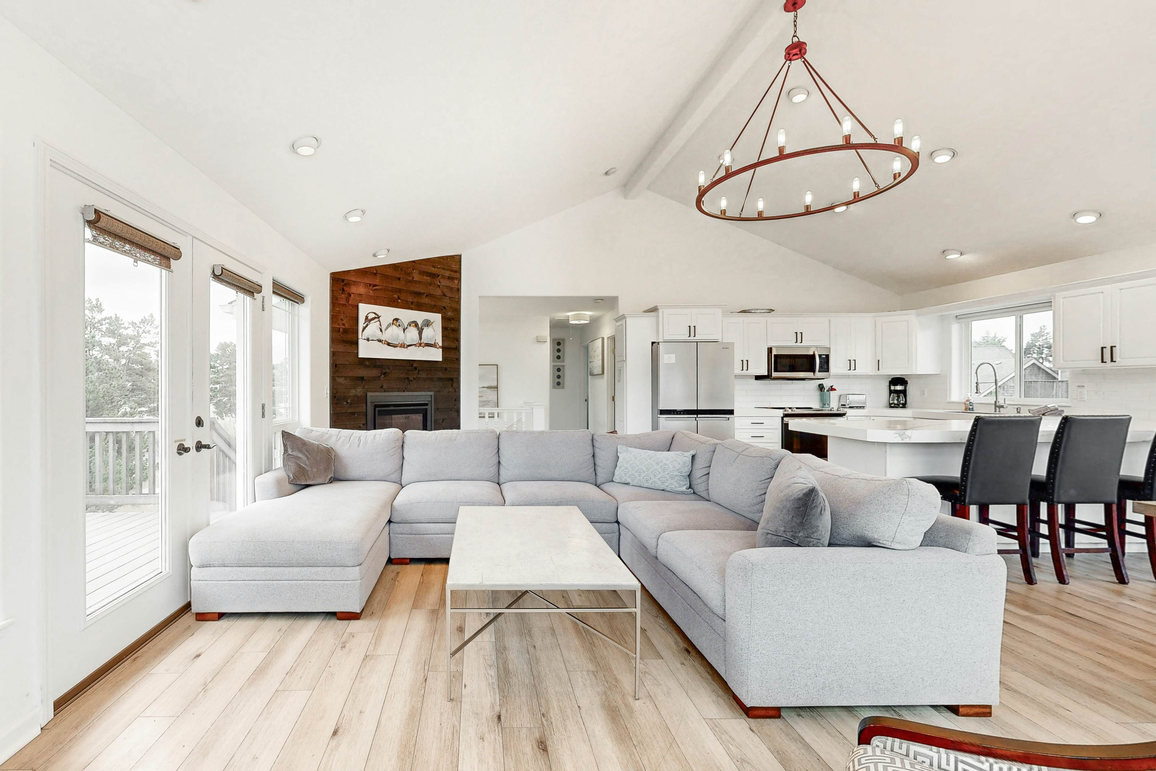 Bright, remodeled home with furnished deck & private beach access - dog-friendly