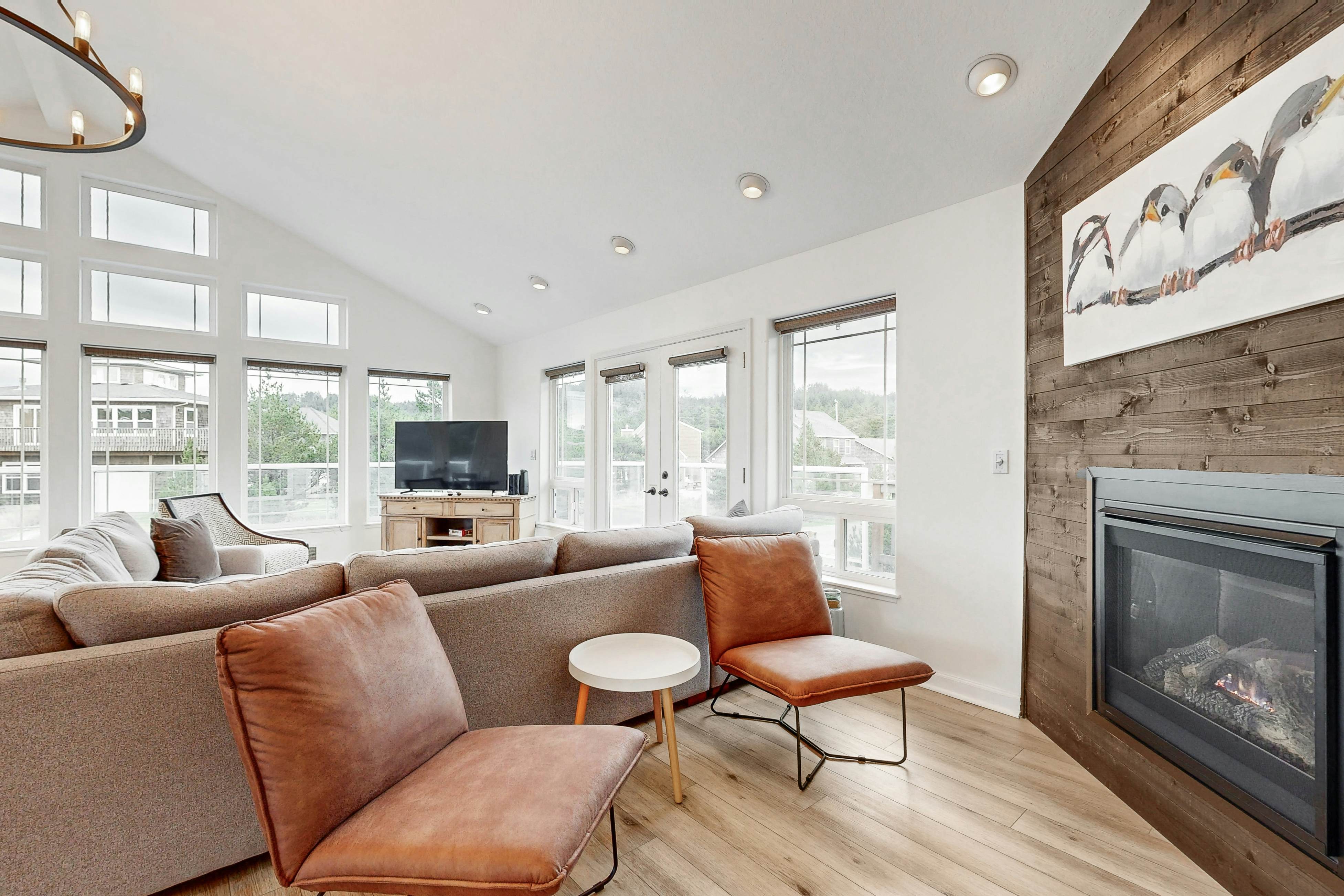 Bright, remodeled home with furnished deck & private beach access - dog-friendly