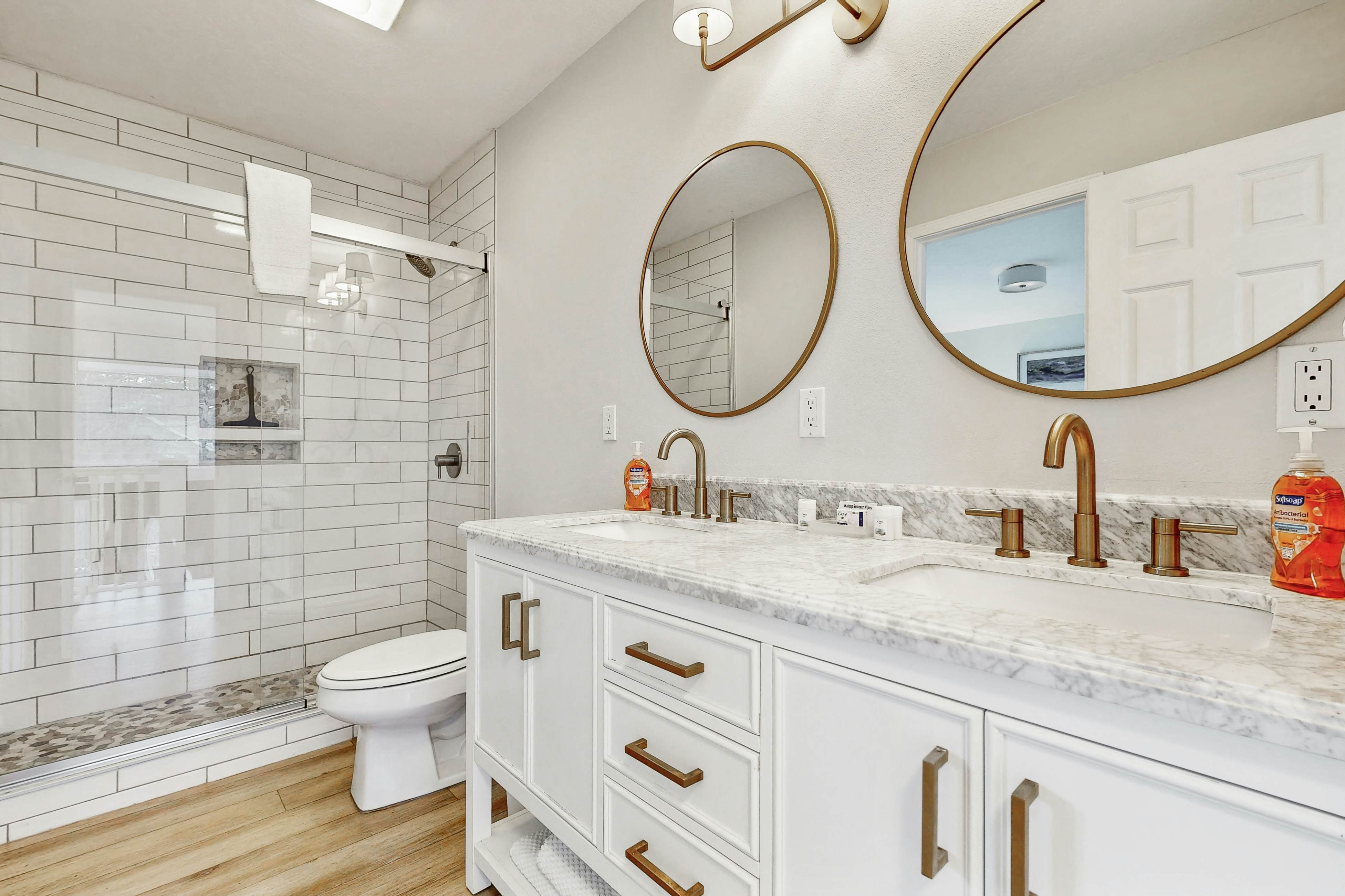 Bright, remodeled home with furnished deck & private beach access - dog-friendly