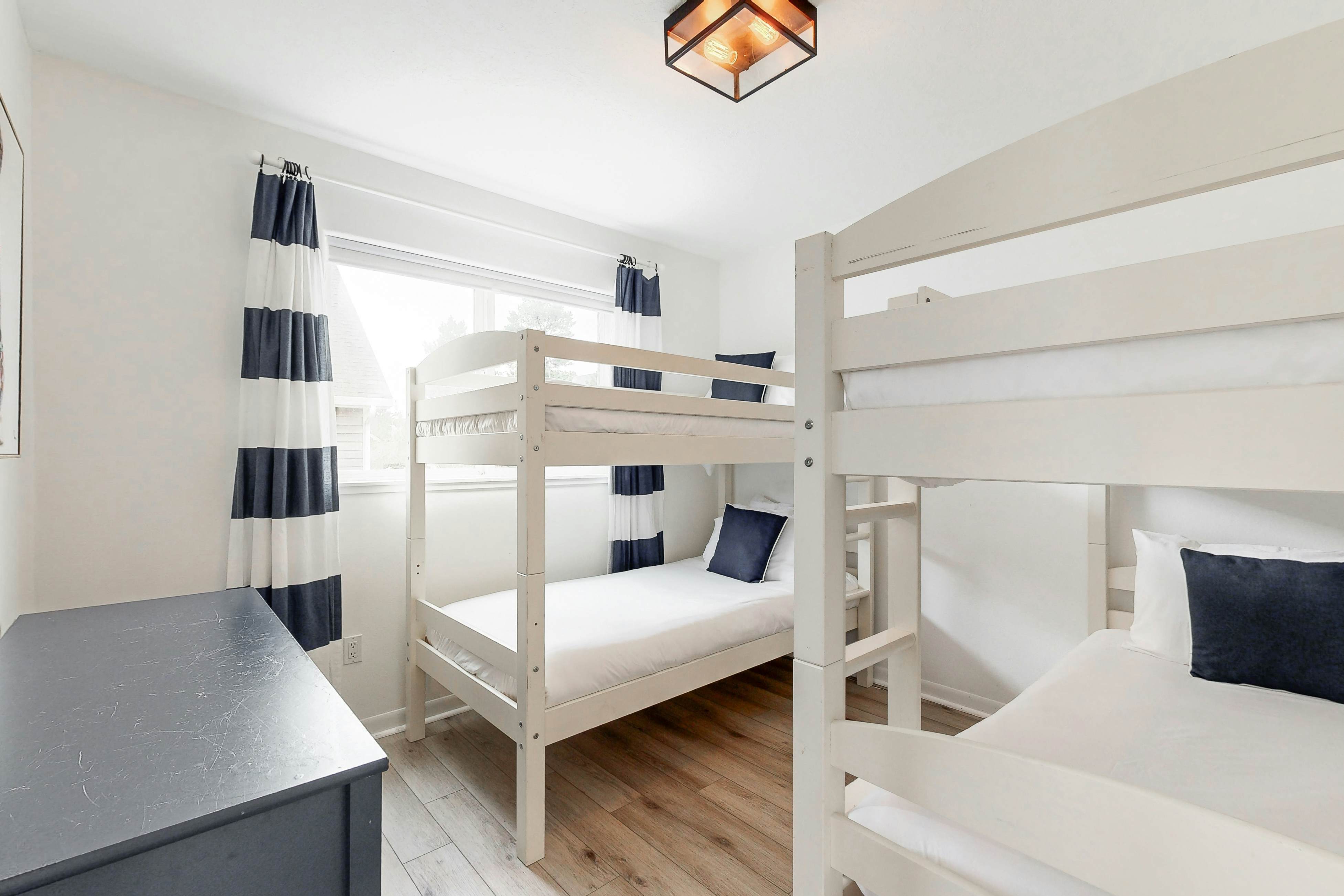 Bright, remodeled home with furnished deck & private beach access - dog-friendly