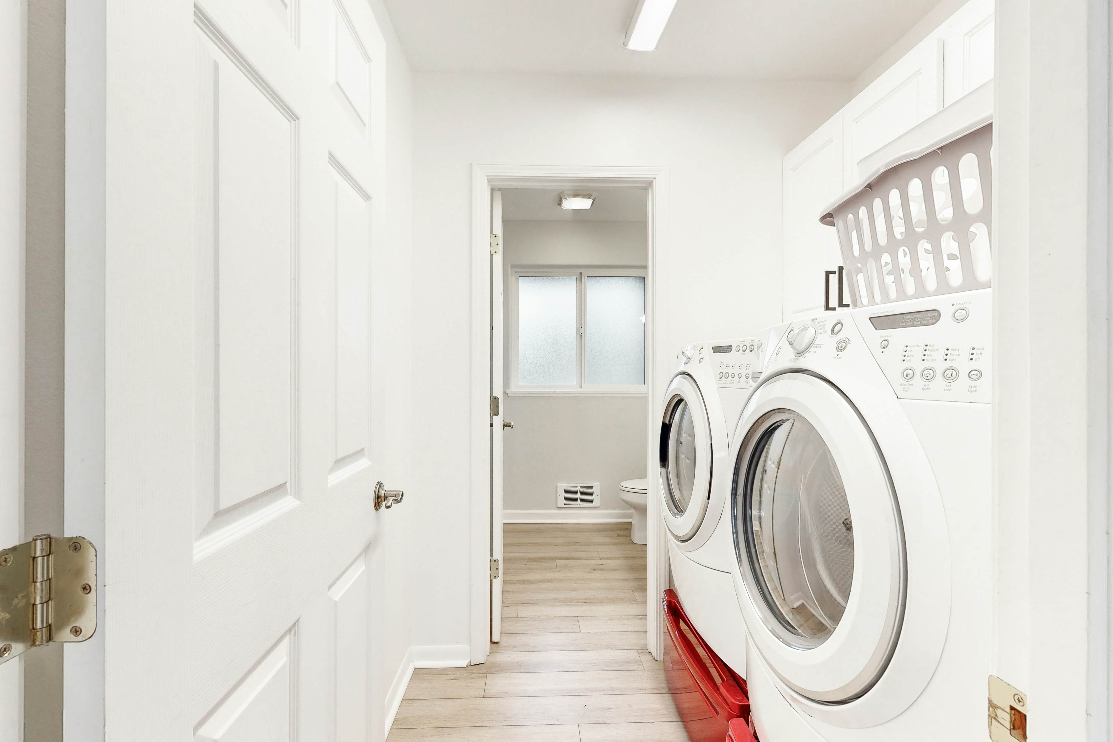 Bright, remodeled home with furnished deck & private beach access - dog-friendly