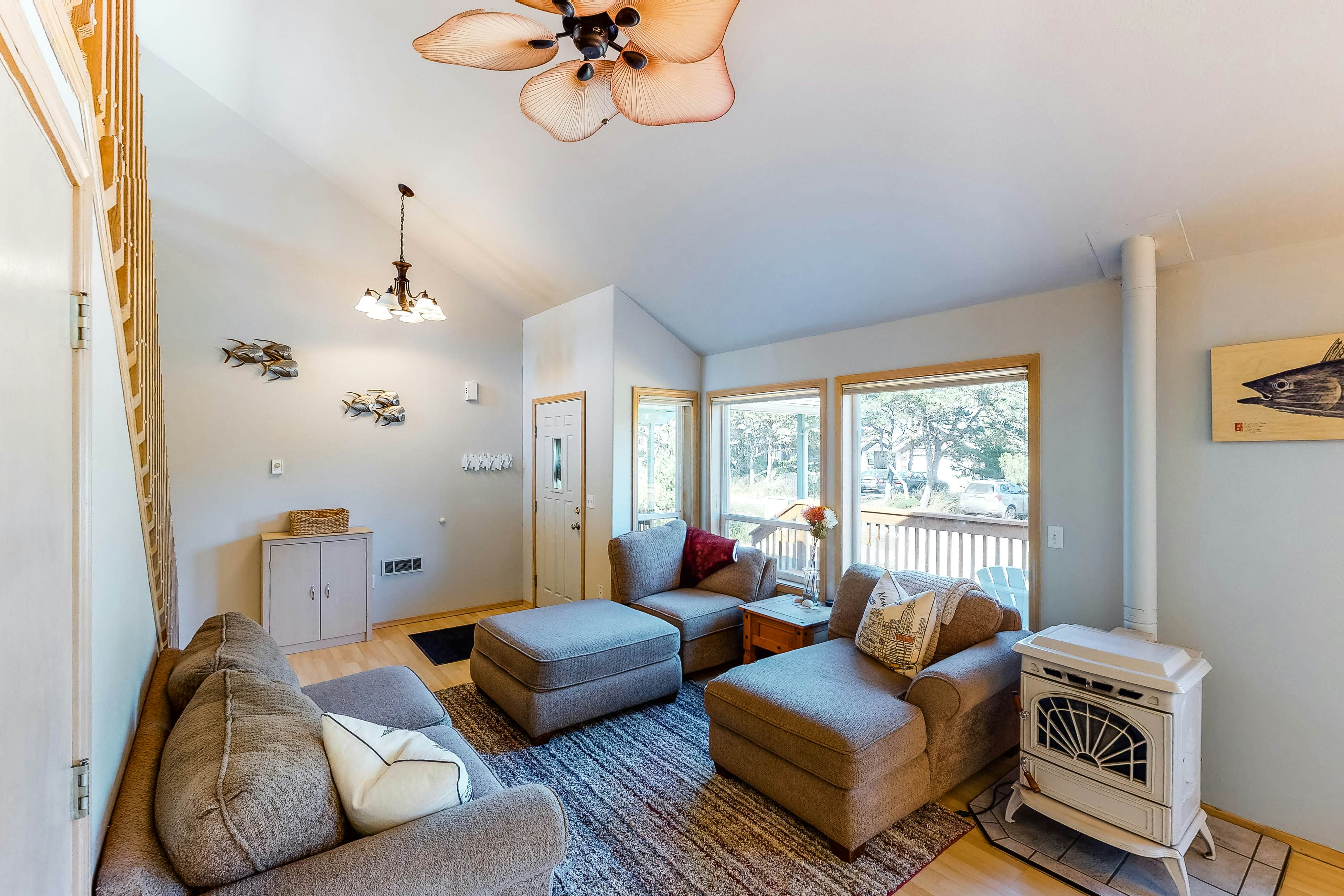 Bright dog-friendly home with wrap-around deck just steps from beach