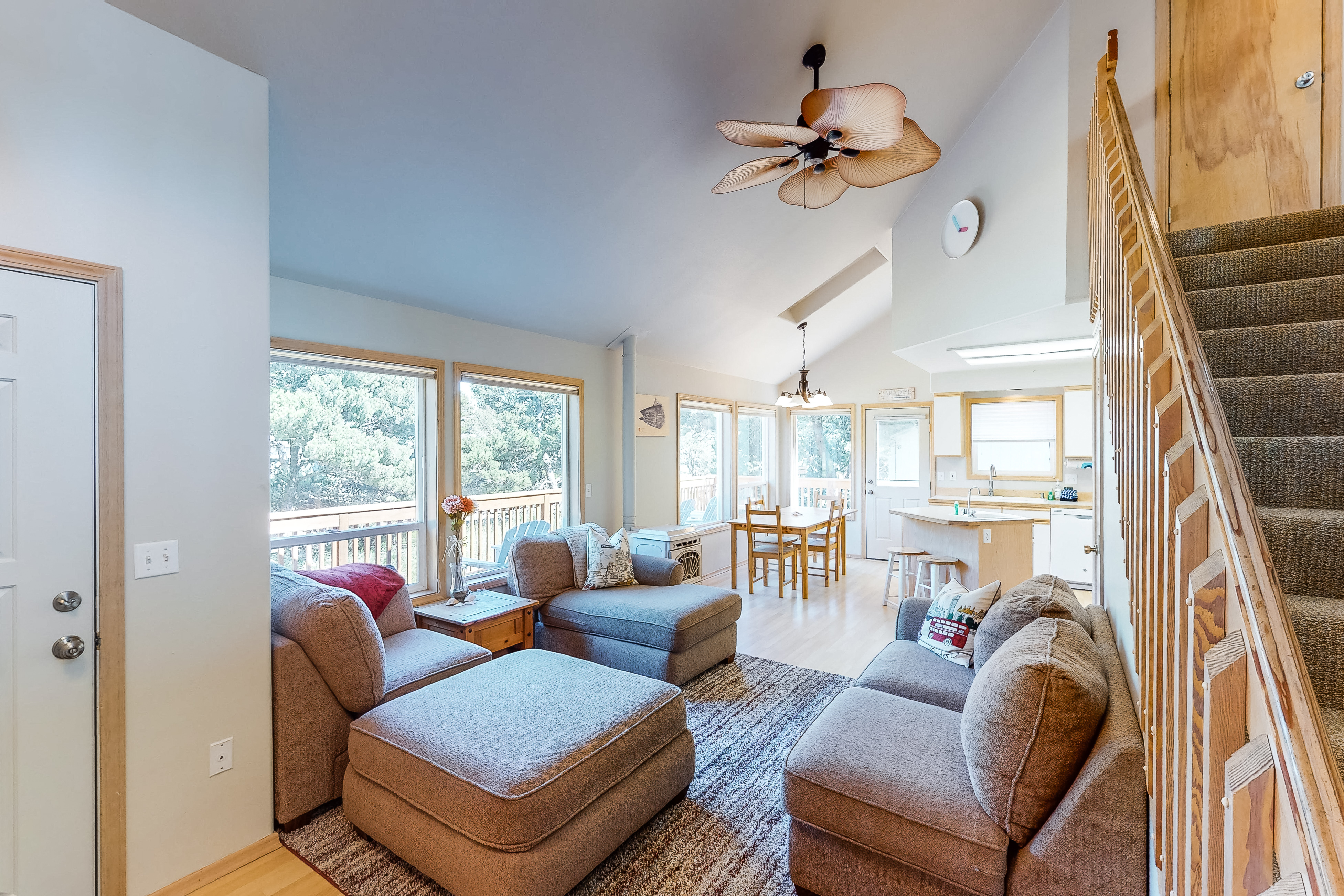 Bright dog friendly home with wrap around deck just steps from beach