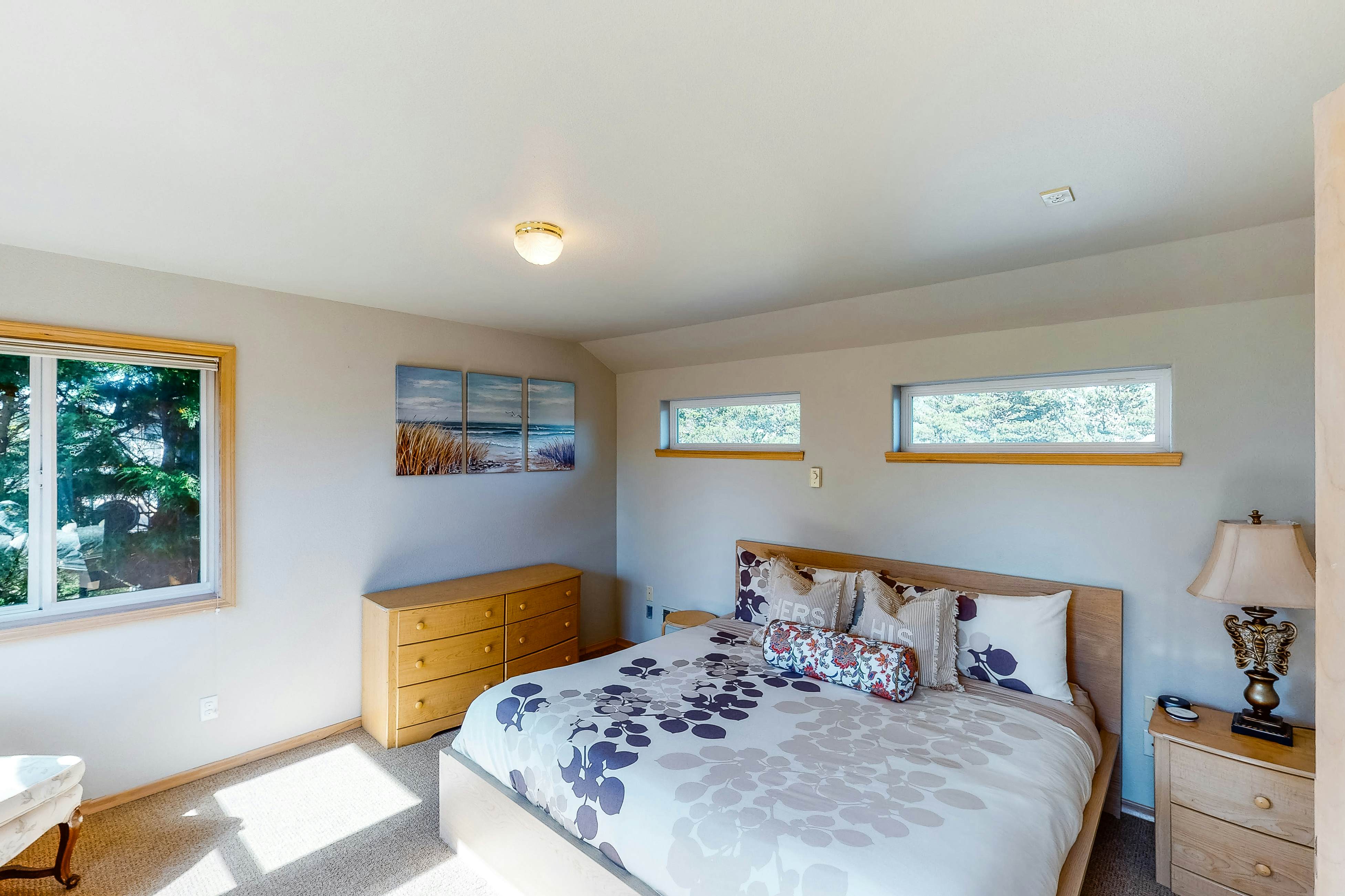 Bright dog-friendly home with wrap-around deck just steps from beach