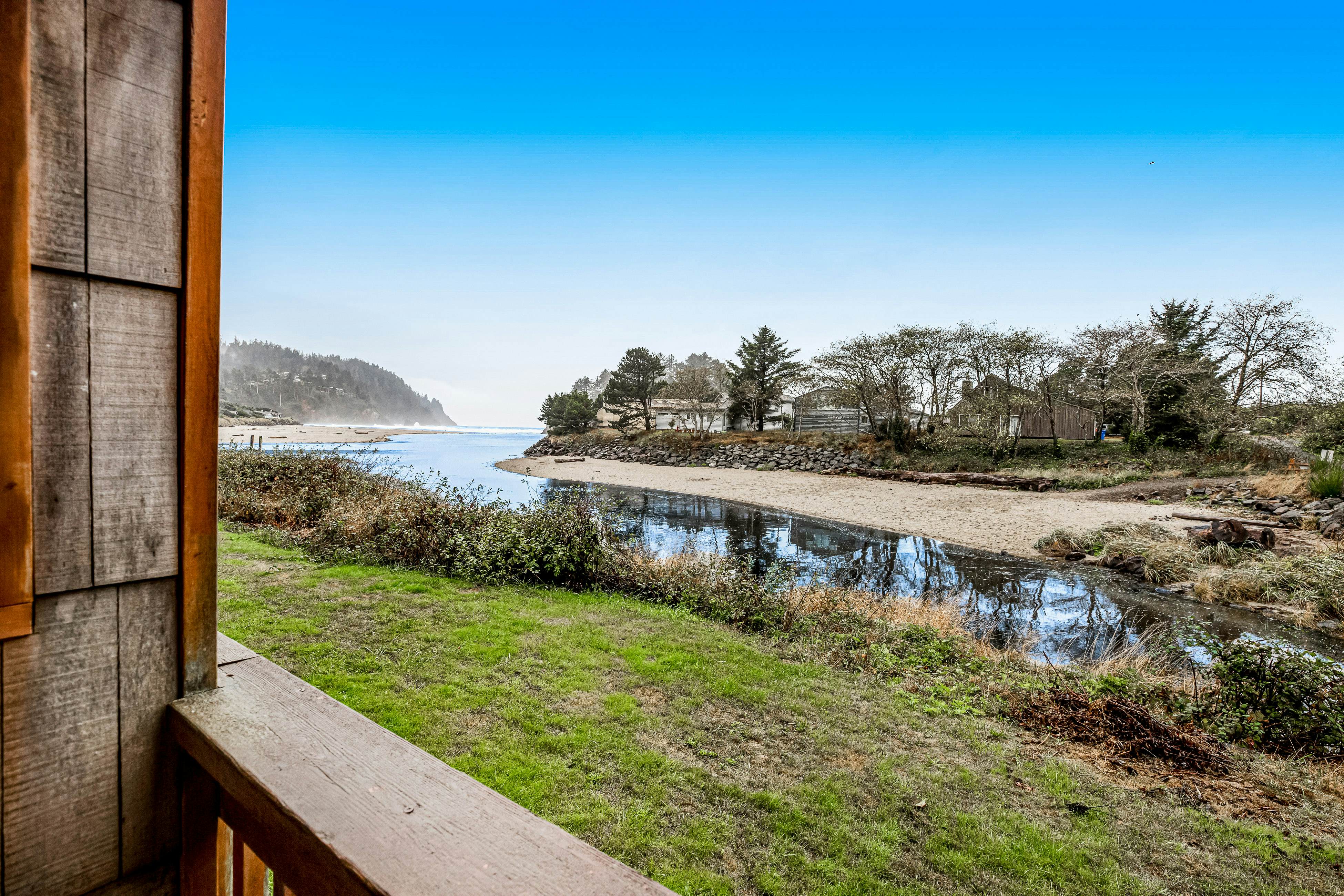 Vibrant, polished condo with oceanfront views, patio & W/D access