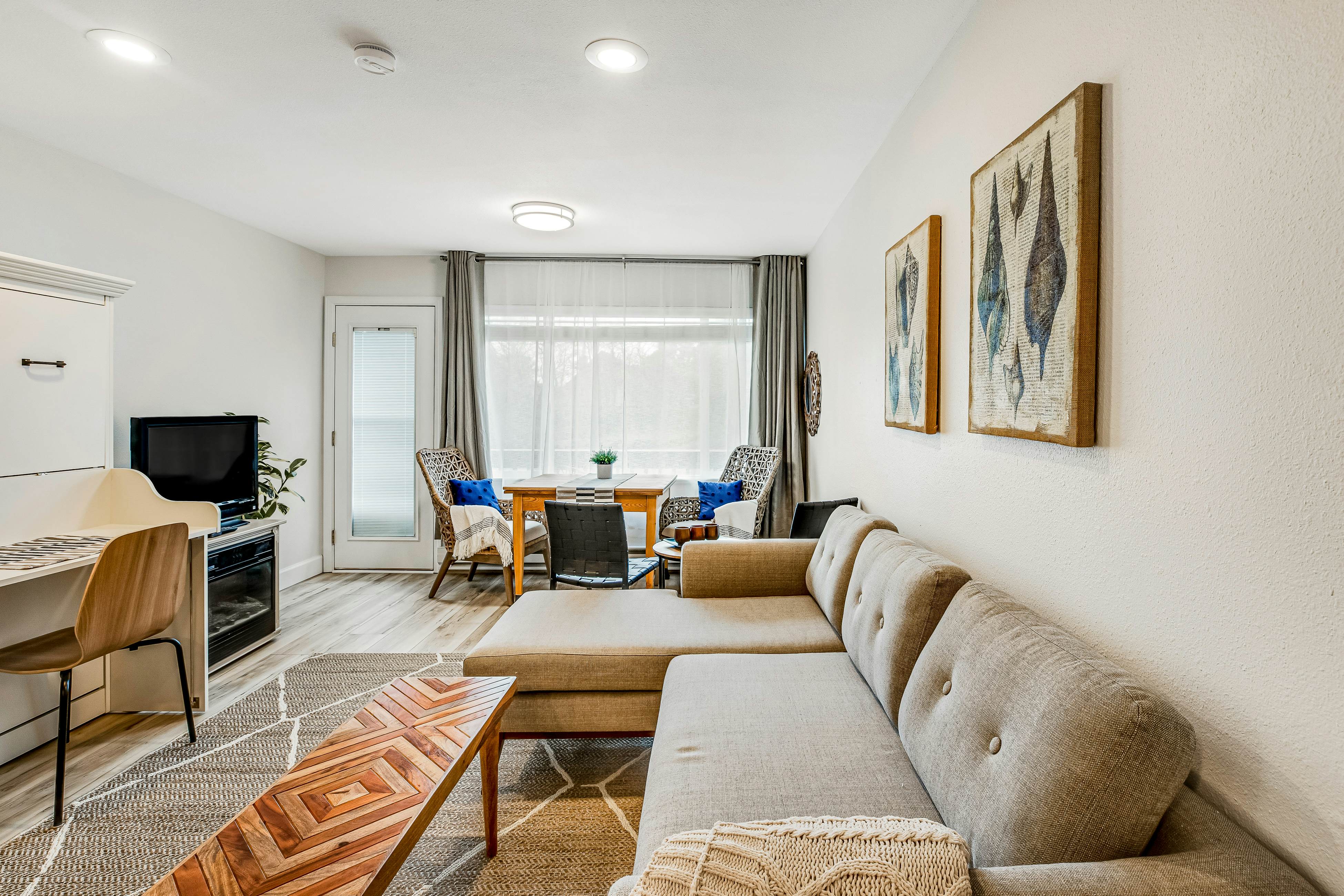 Vibrant, polished condo with oceanfront views, patio & W/D access