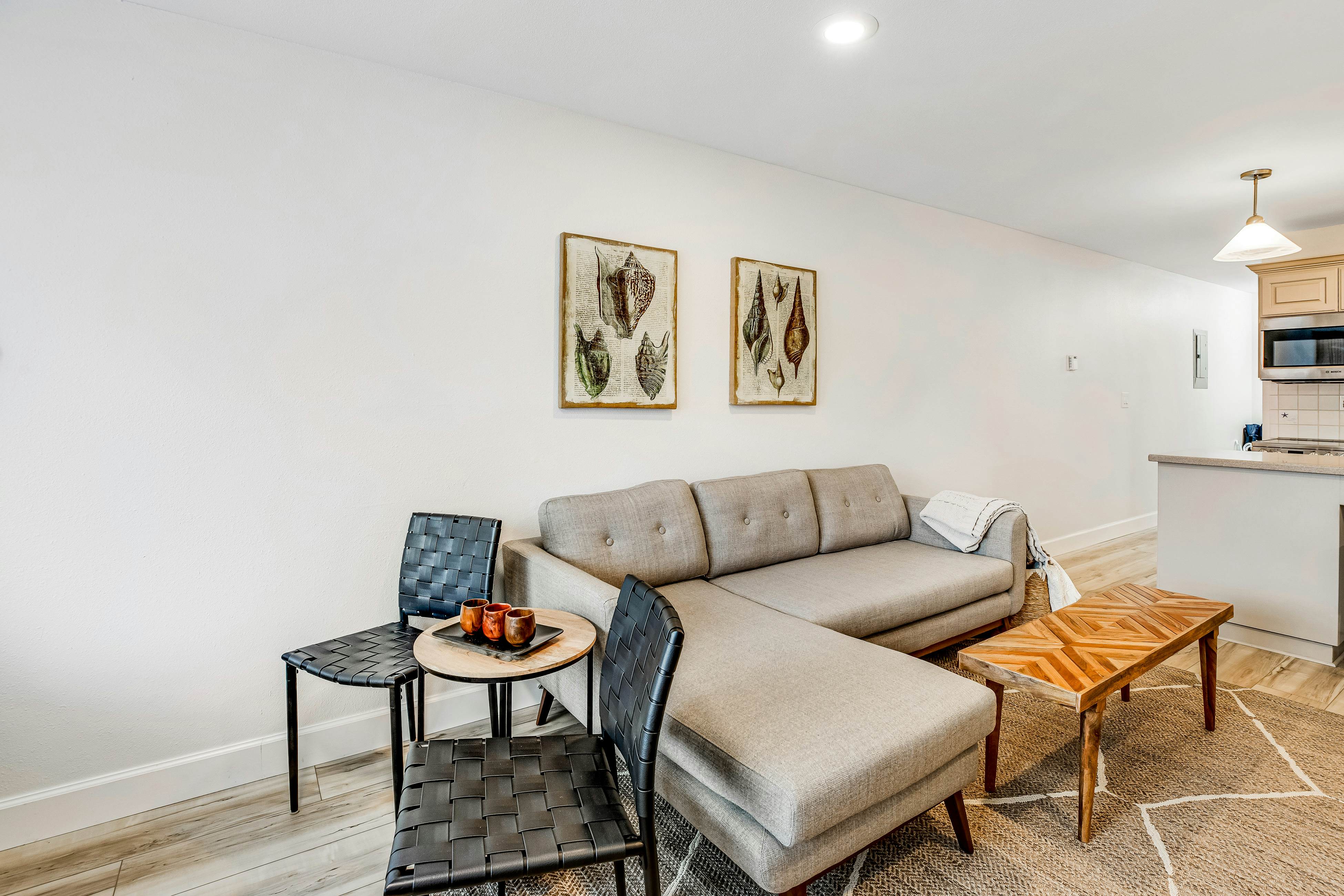 Vibrant, polished condo with oceanfront views, patio & W/D access