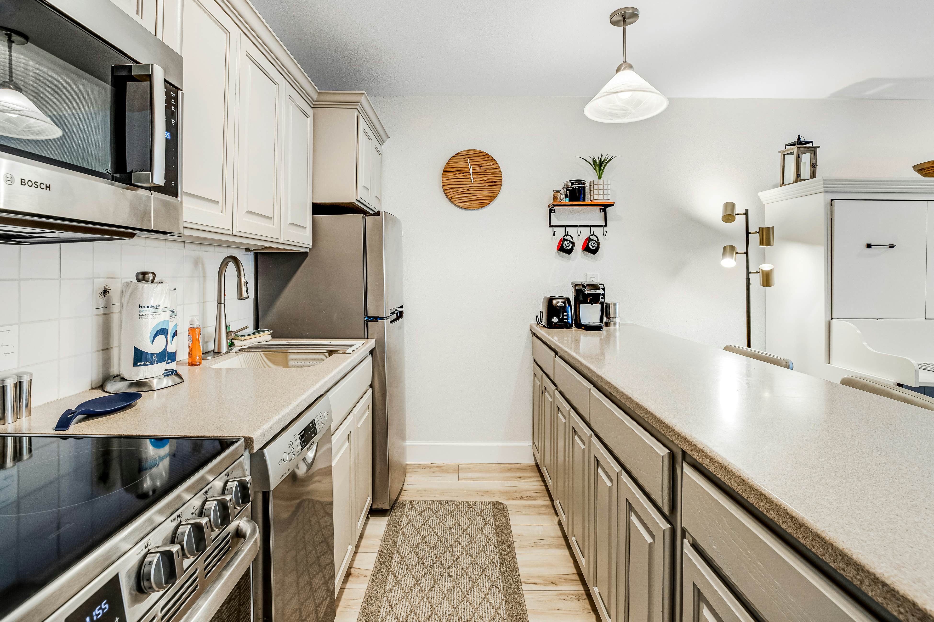 Vibrant, polished condo with oceanfront views, patio & W/D access