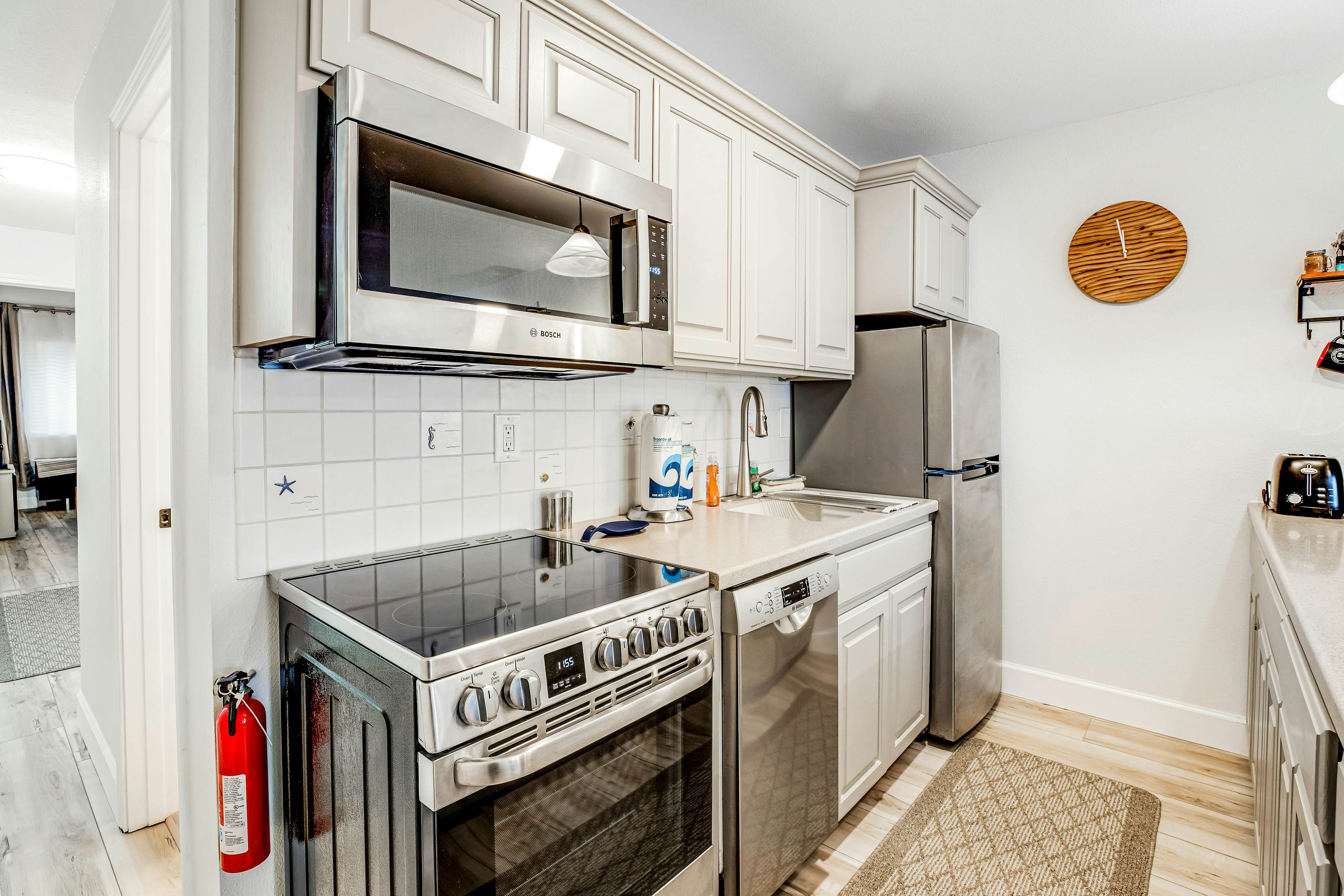 Vibrant, polished condo with oceanfront views, patio & W/D access