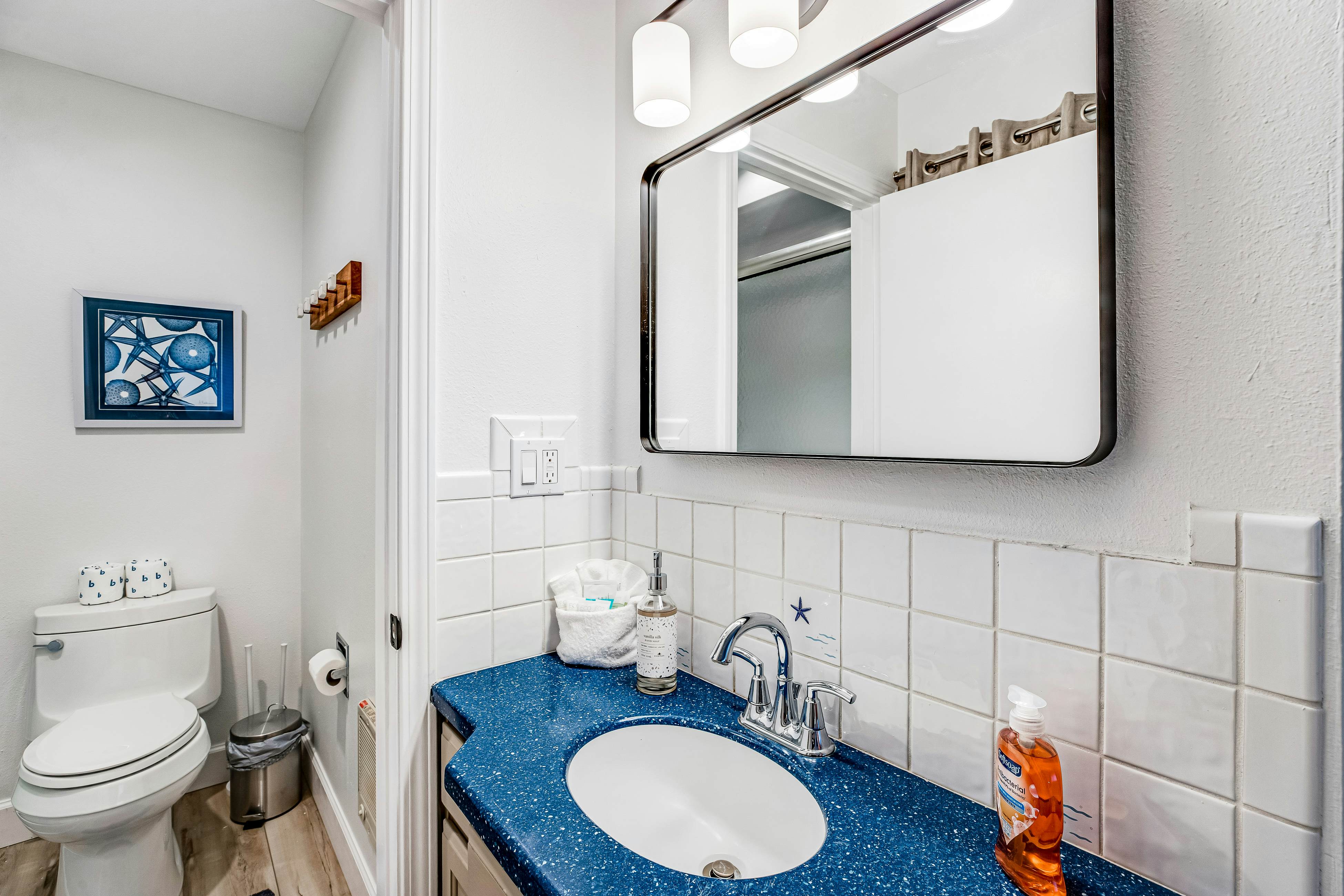 Vibrant, polished condo with oceanfront views, patio & W/D access