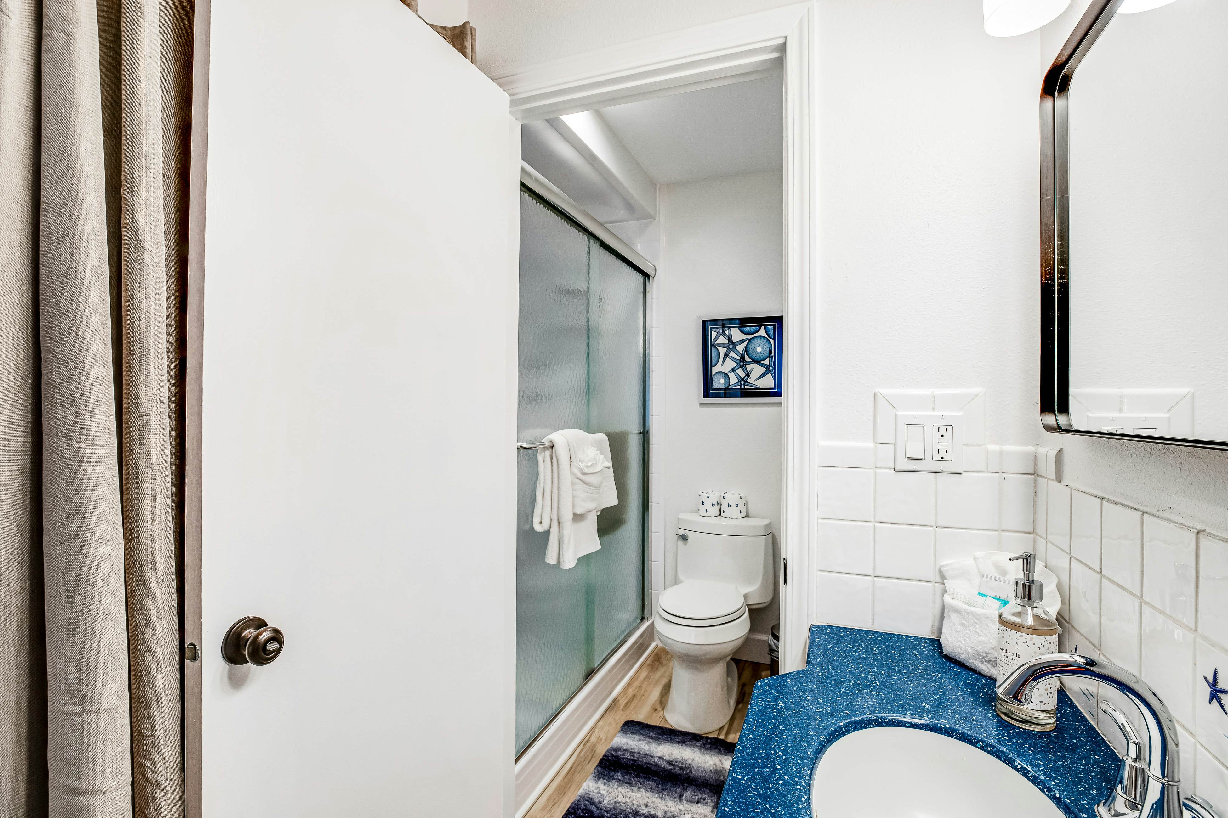 Vibrant, polished condo with oceanfront views, patio & W/D access