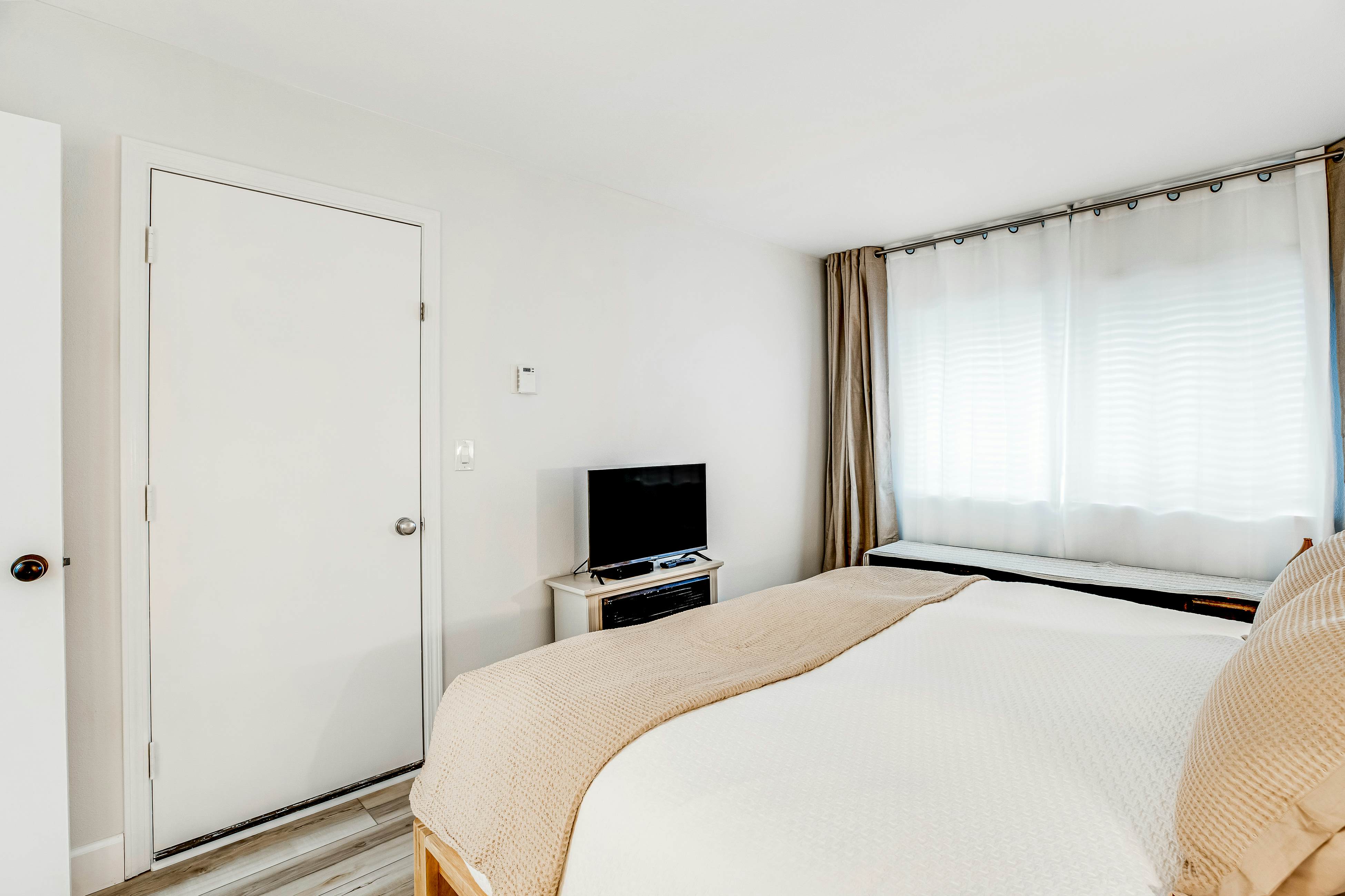 Vibrant, polished condo with oceanfront views, patio & W/D access