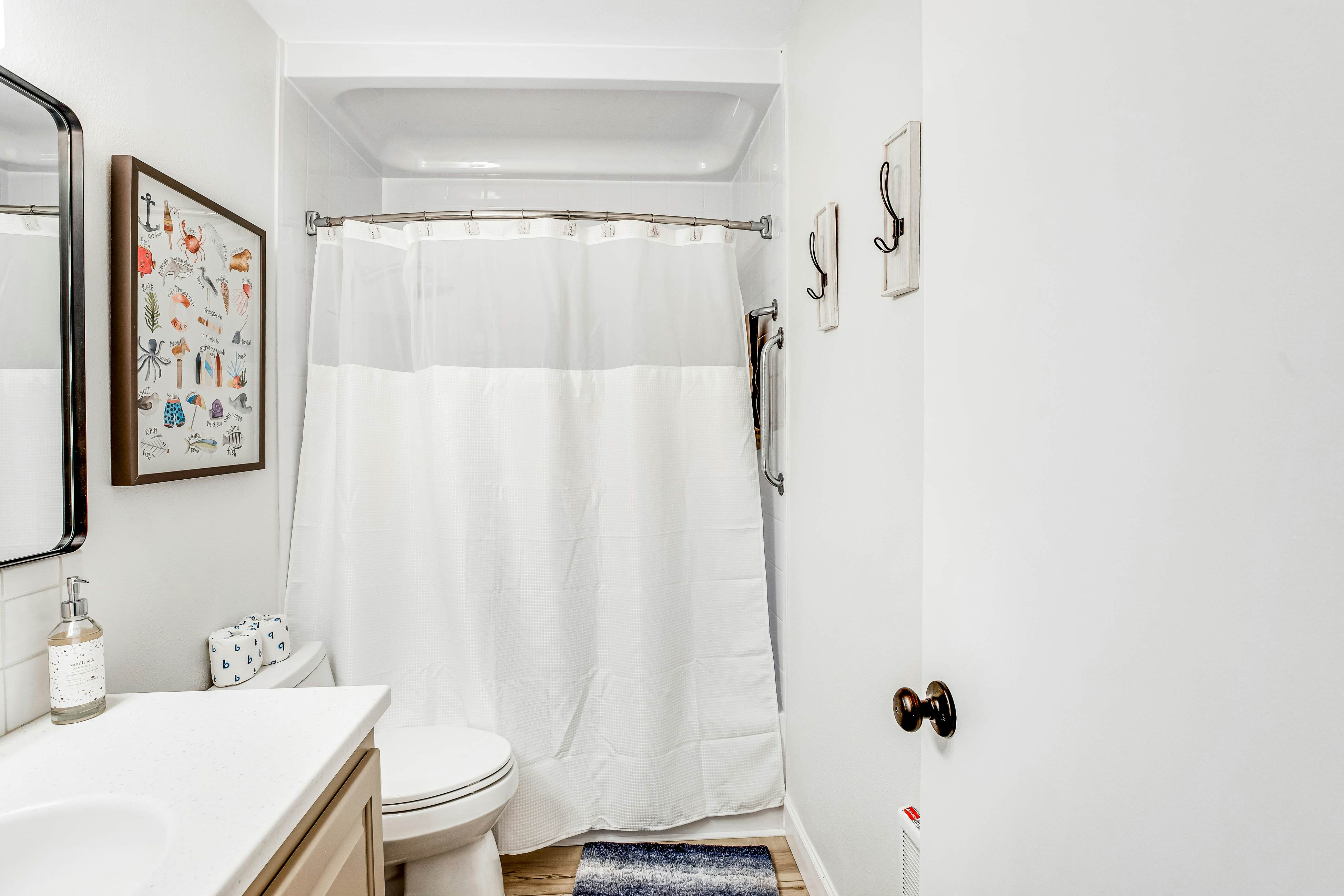 Vibrant, polished condo with oceanfront views, patio & W/D access