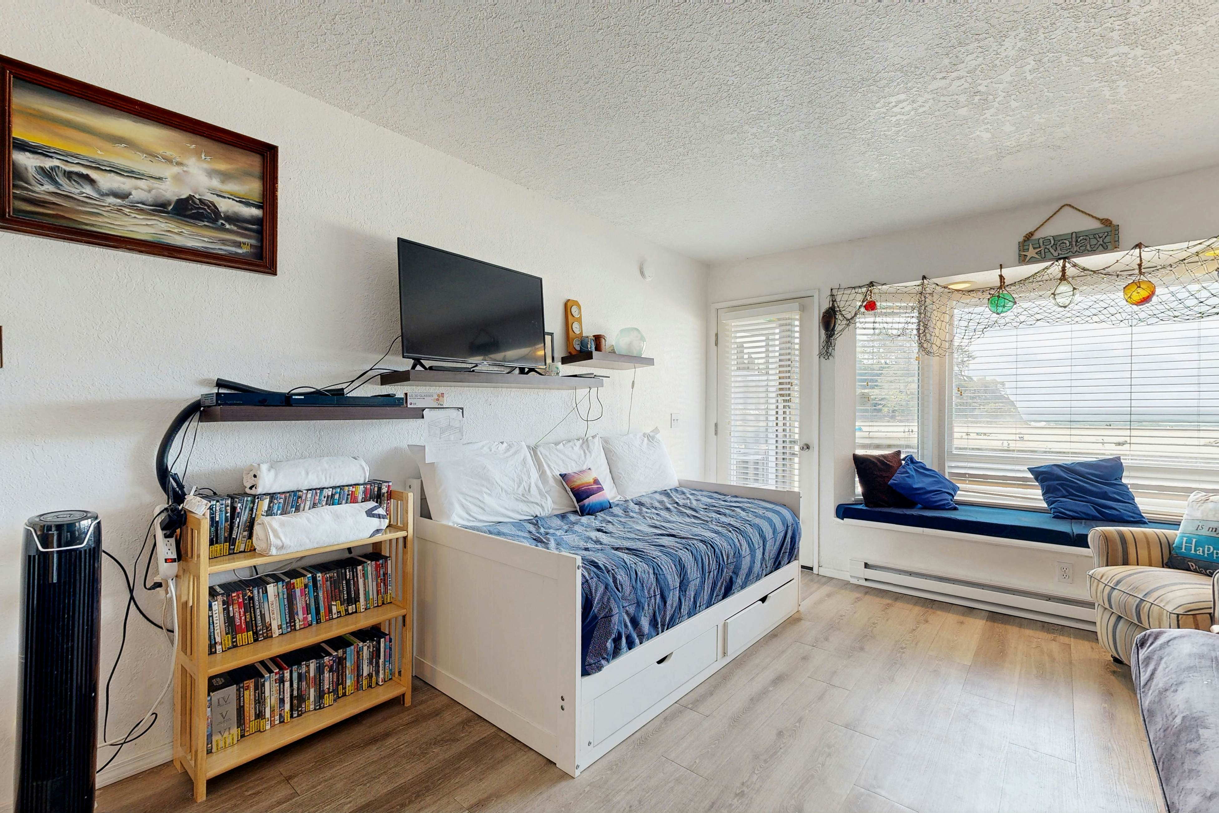 Dog-friendly oceanfront condo with beach access & Proposal Rock view