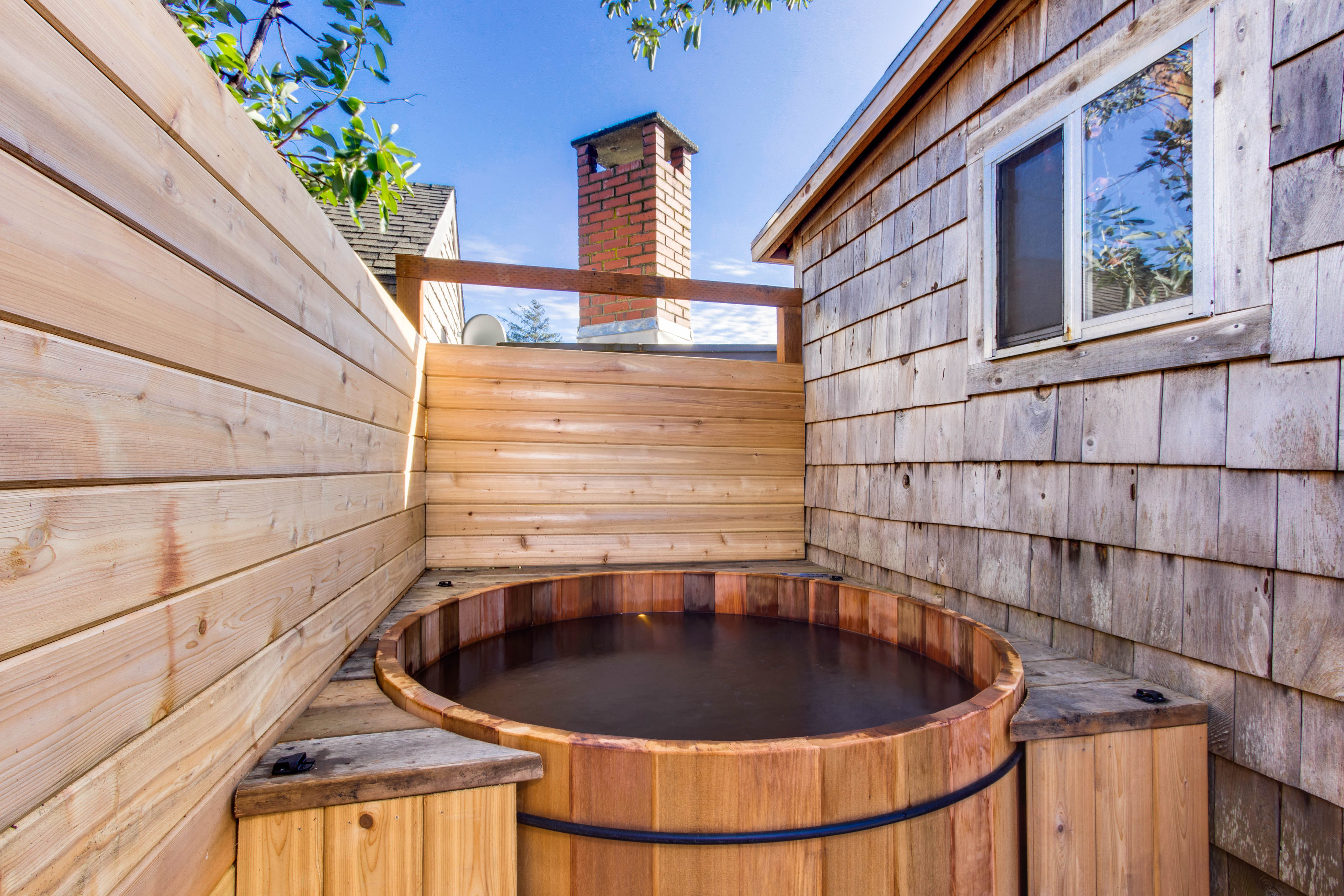 Quiet Coastal Cabin Home with Private Hot Tub Less Than a Block From Beach