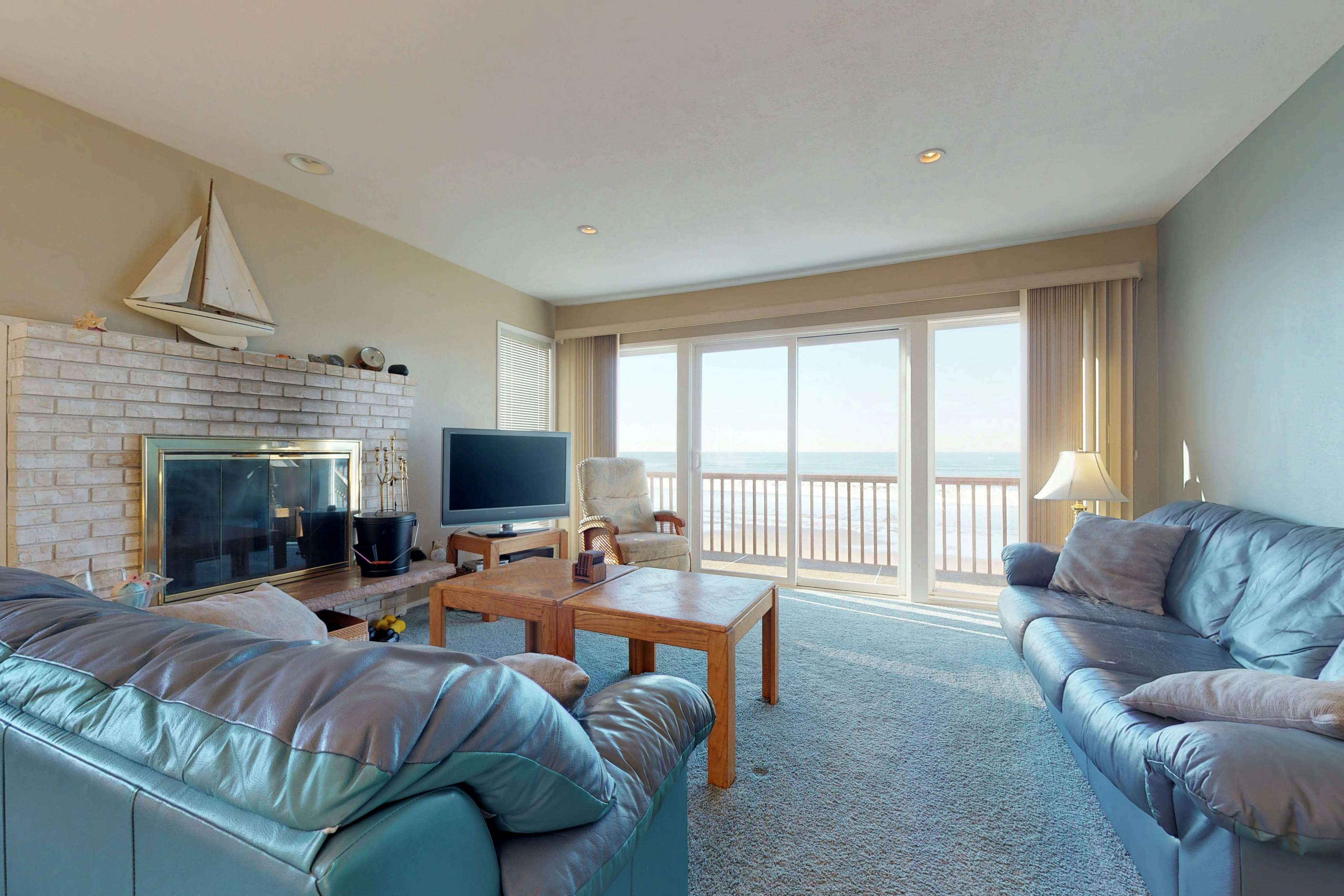 Dog friendly oceanfront condo with amazing ocean views steps to beach