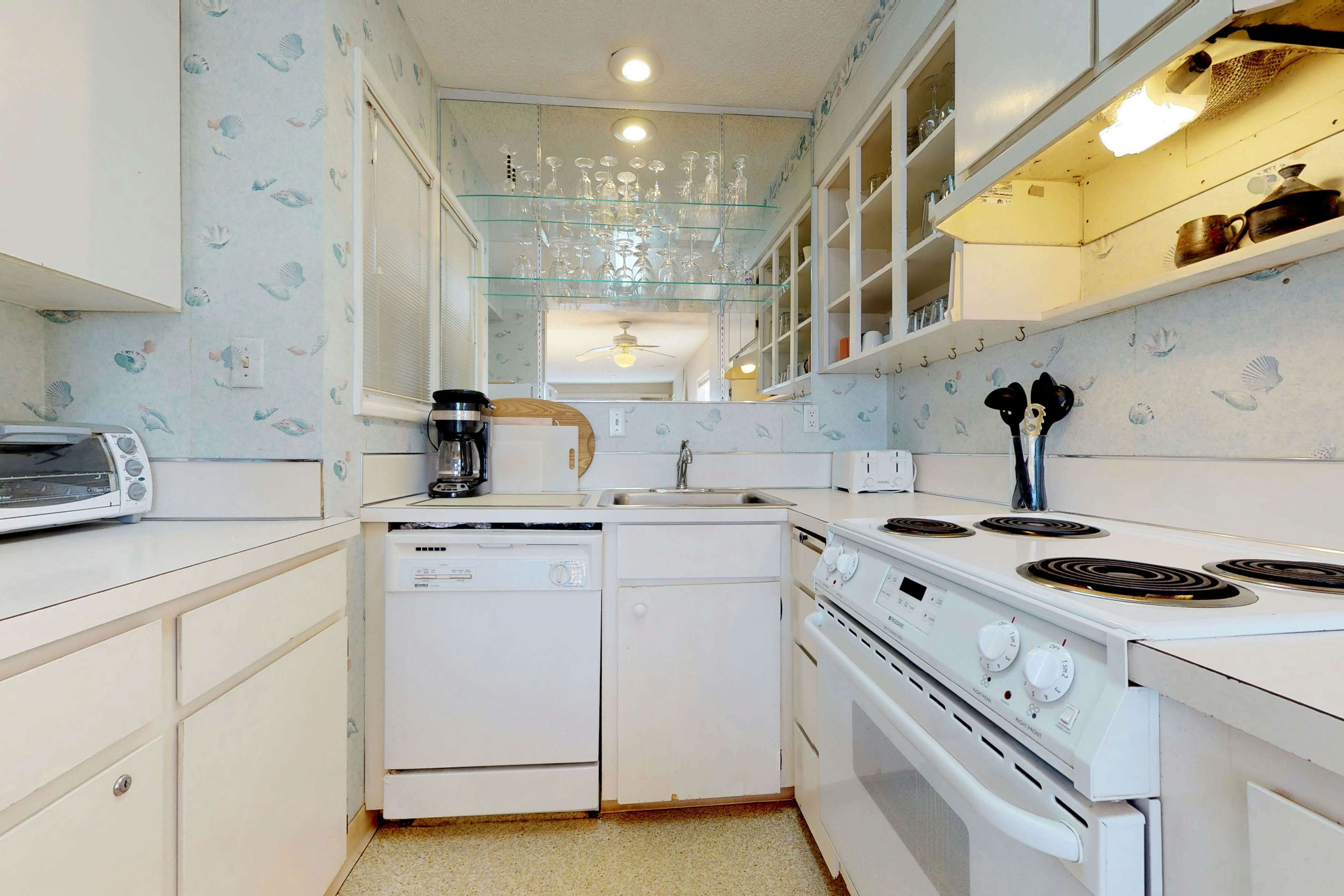 Dog friendly oceanfront condo with amazing ocean views steps to beach