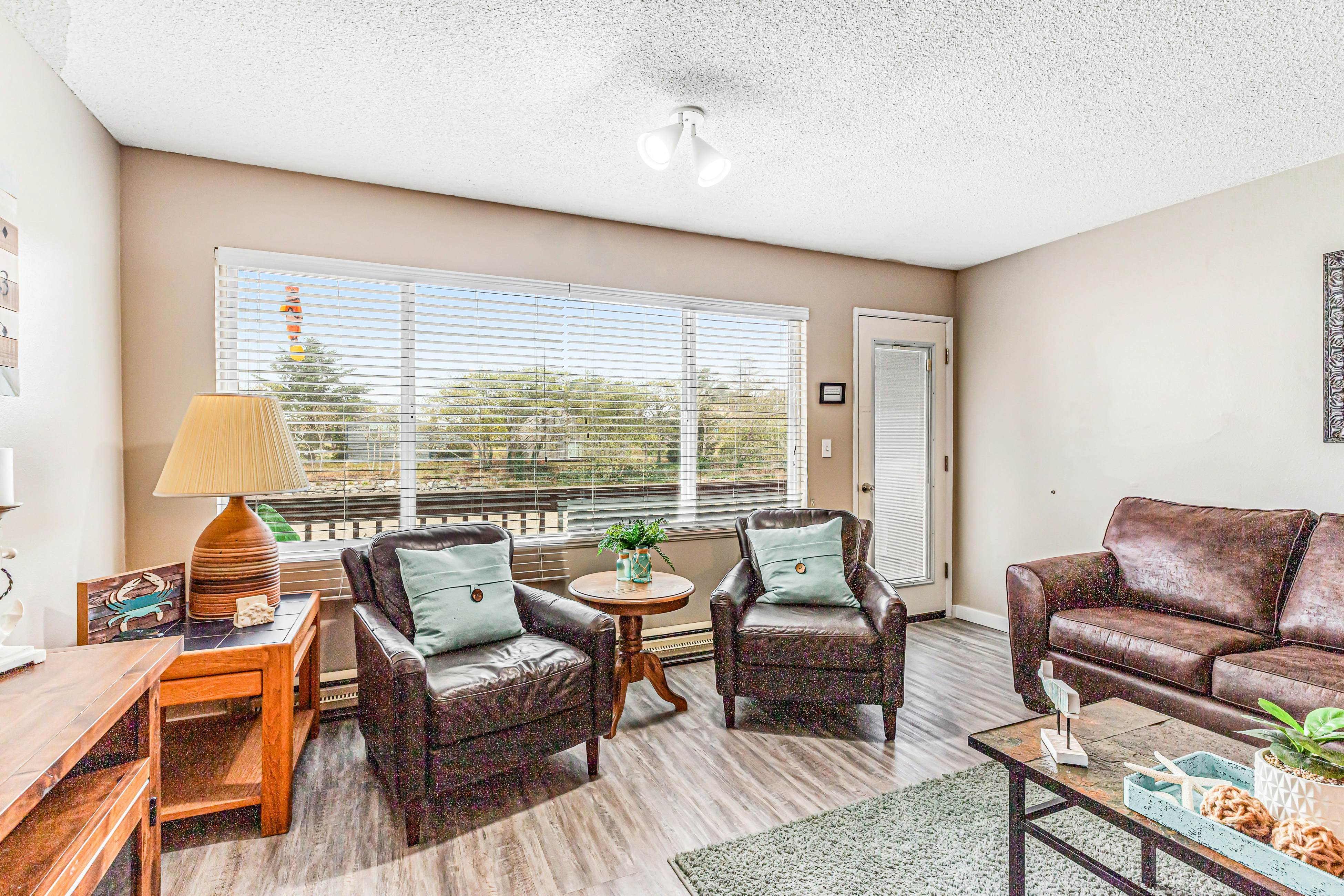 Oceanfront, 2nd-floor condo with river/ocean views, balcony & beach access