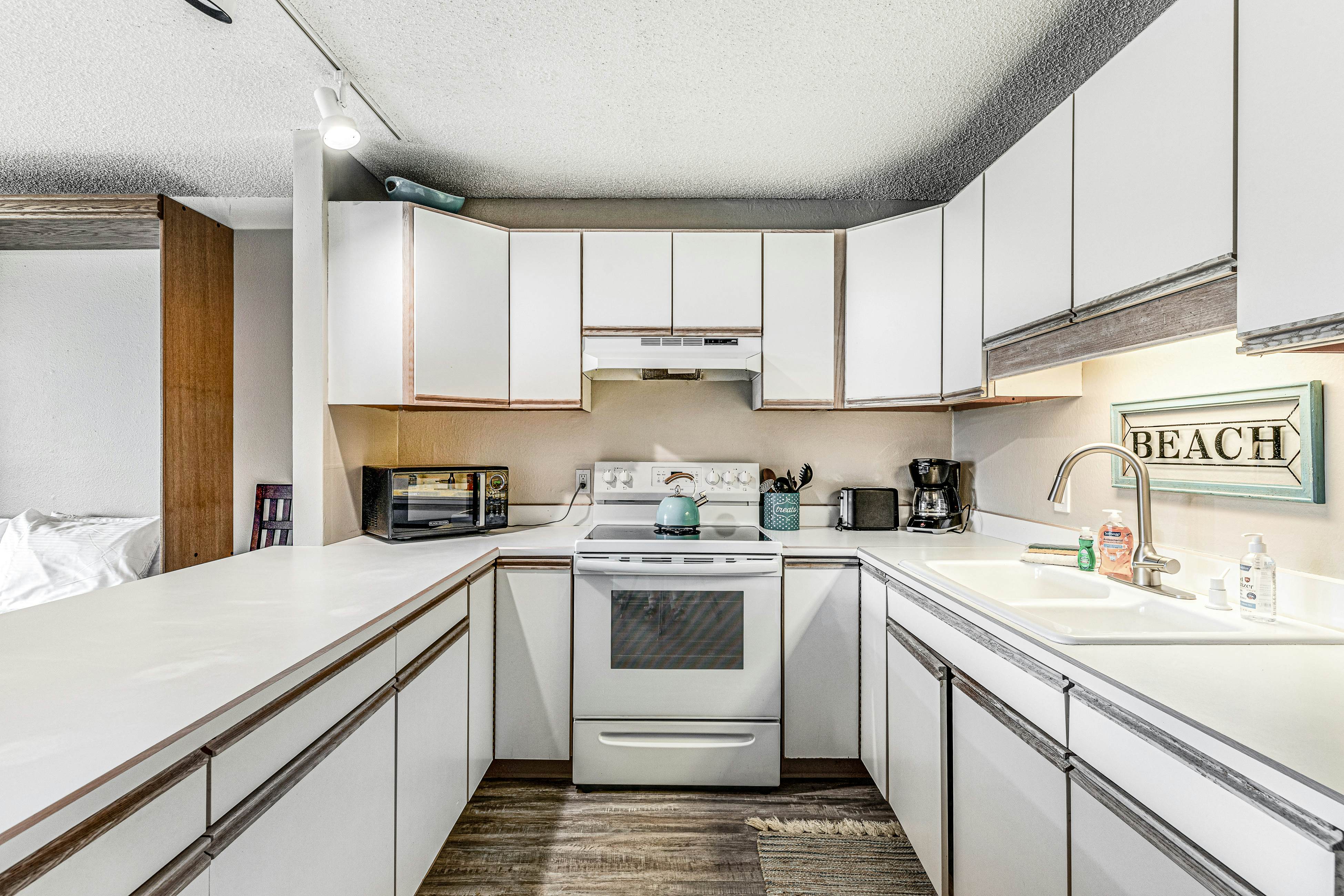 Oceanfront, 2nd-floor condo with river/ocean views, balcony & beach access